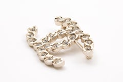 Chanel Large Silver-Tone and Crystal Embellished CC Brooch
