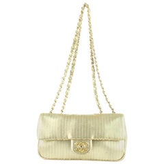 Chanel Laser Cut Small Classic Chain Flap 13ce0104 Gold Leather Cross Body Bag