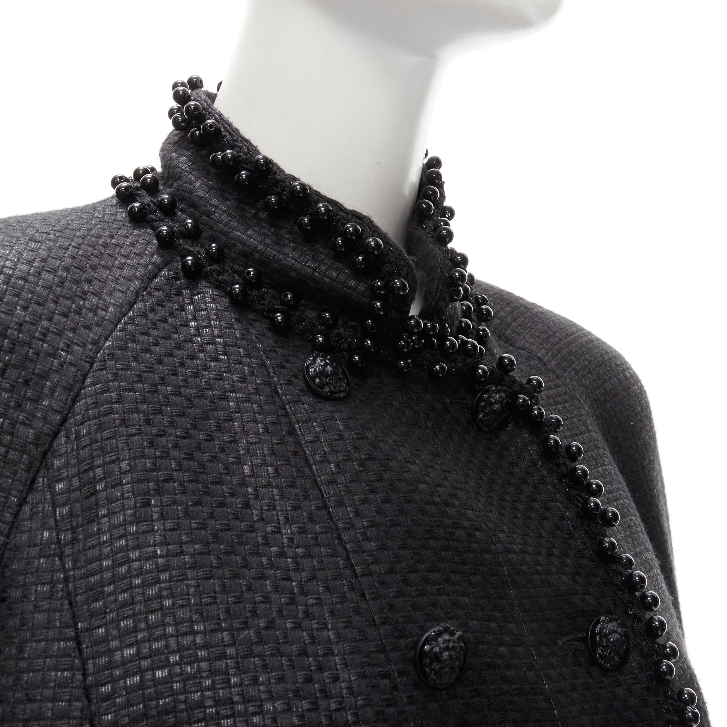 CHANEL lattice lacquered tweed bead embellished Lion CC button jacket FR42 L
Brand: Chanel
Designer: Karl Lagerfeld
Collection: Circa 2009 
Material: Acrylic
Color: Black
Pattern: Solid
Closure: Button
Extra Detail: So Black lattice weave tweed.