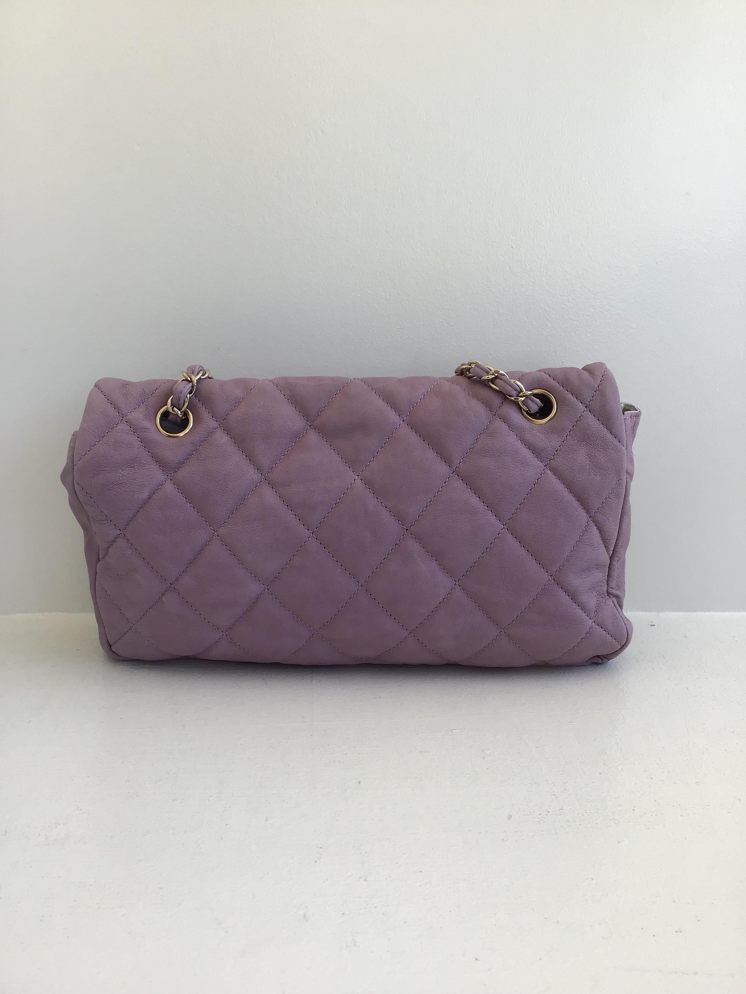 Chanel Lavender Flap Purse with Gold Hardware, Size Medium
Manufacturer Period: 2005 to 2006
Included:
Card of Authenticity
2X2 Black Envelope (Care Instructions)
Description:
Size: Medium
Leather: Lambskin
Color: Lavender
Lining: Chanel Embossed