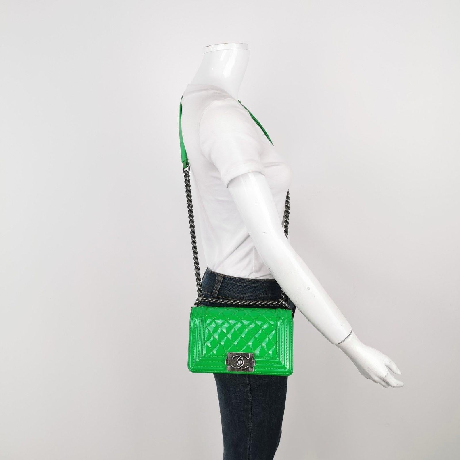 Chanel Le Boy 2016 Small Green Patent Leather Bag These are professional photos of the actual bag offered by Luxbags. CONDITION: Very good condition with signs of use. This may include fading of material or plating. Scrapes on the leather around the
