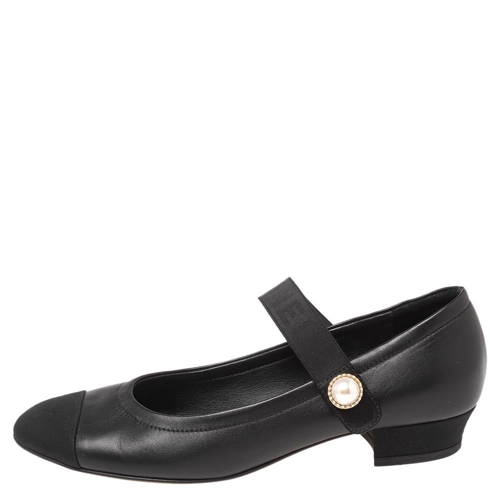 The House of Chanel masterfully makes pieces that strike a healthy balance between timeless and contemporary designs. Chanel improvises on the highly popularized, vintage Mary Jane shoes to put forth these pumps. They flaunt black leather and fabric