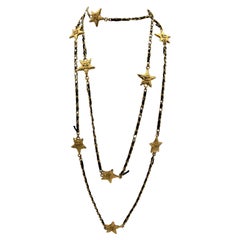 Chanel collana di stelle in pelle e catena dorata 2010