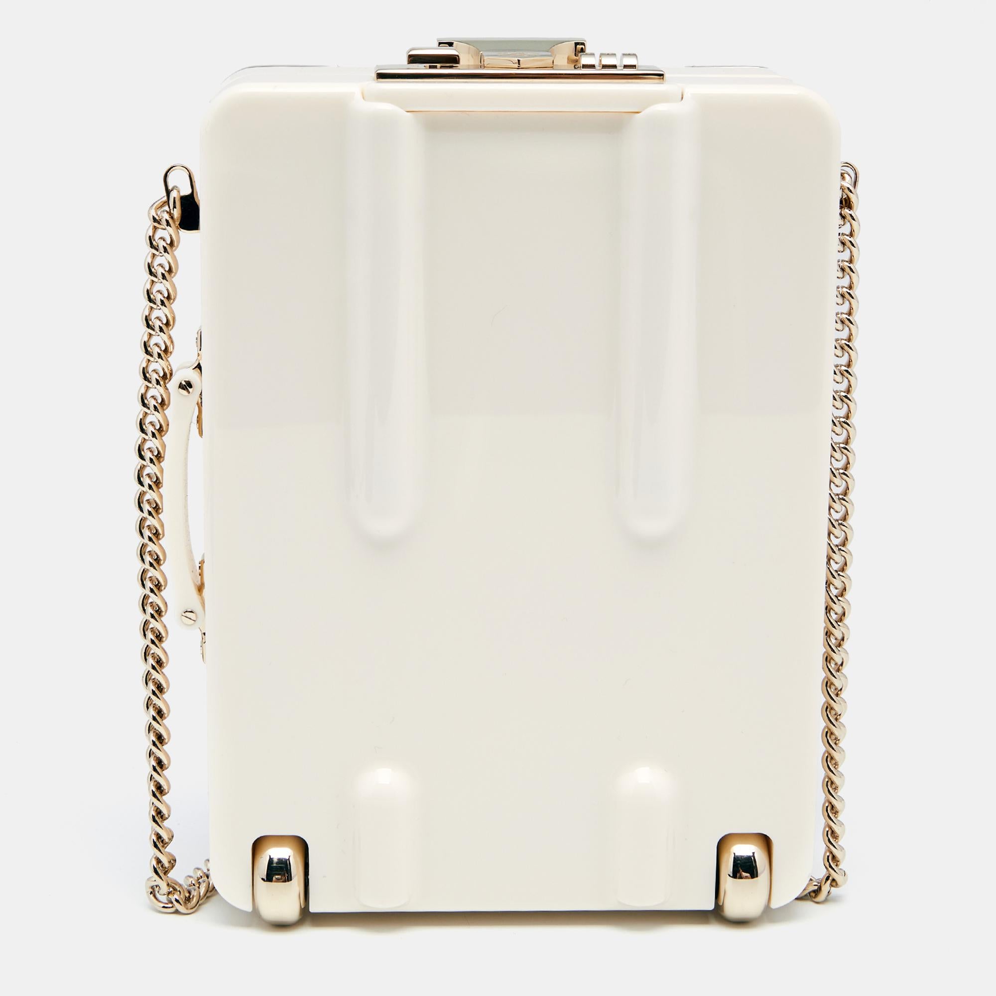 Chanel's Evening In The Air clutch exhibits the brand's flair to make chic designs with subdued charm. The exterior is a construction of patent leather and perspex, accentuated by quilts. The silhouette comes in the minaudière size and resembles a