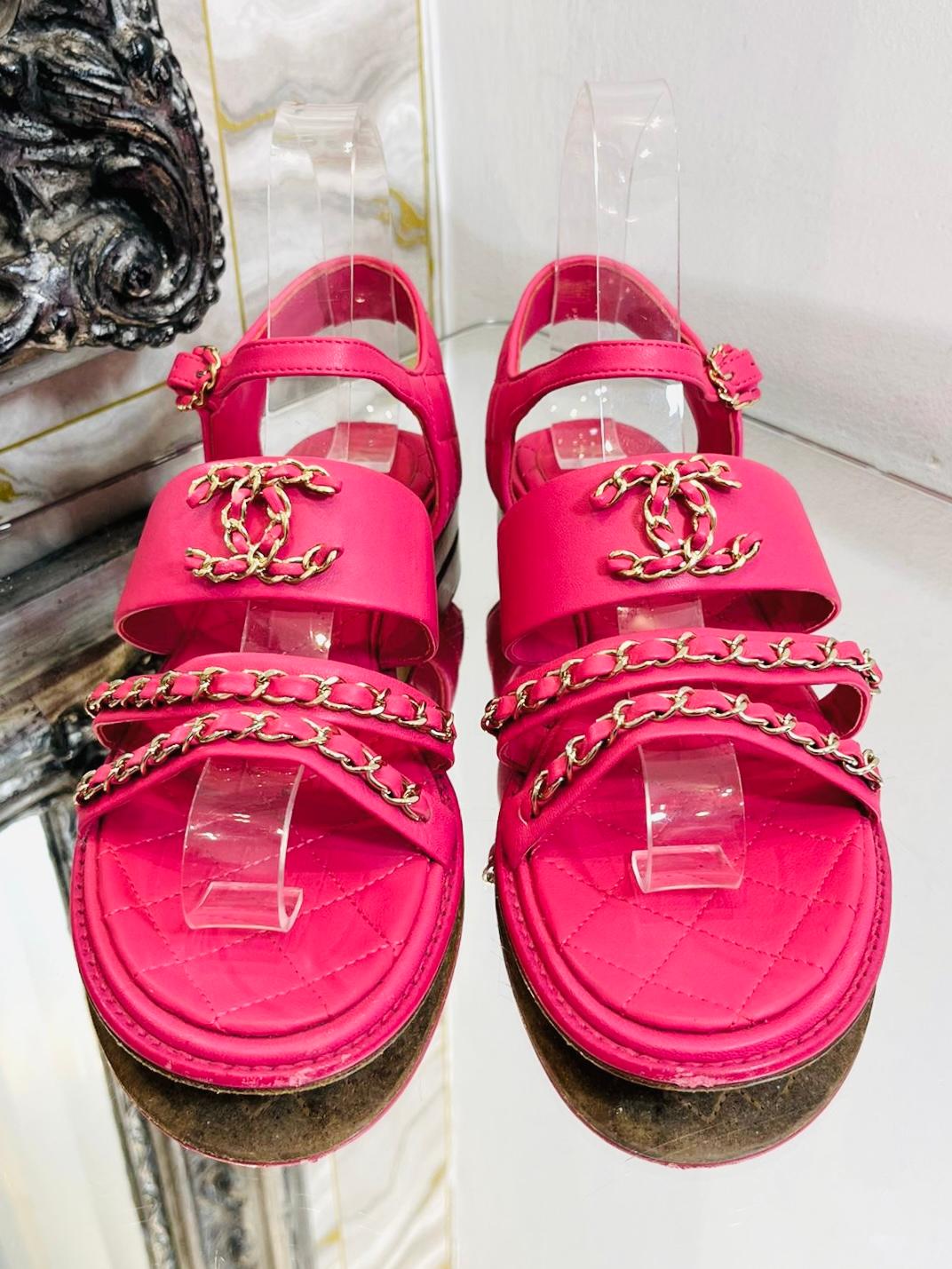 Chanel Leather & Chain 'CC' Logo Sandals

From 2016 Cruise Collection. Fuchsia pink leather, strappy sandals, 

with champagne gold chain signature trim and large 'CC' logos the 

each front.

Size - 37

Condition - Good (Slight scuff marks to the