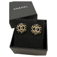 CHANEL Leather 
Crystal CC Circle Stud Earrings