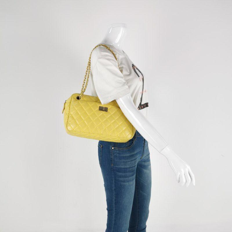 Chanel Leather Quilted Medium 2.55 Mademoiselle Camera Case Bag, 2008-2009
These are professional photos of the actual bag.
  This is an authentic Chanel handbag. It is crafted from luxurious lambskin leather with a quilted stitching. It's adored
