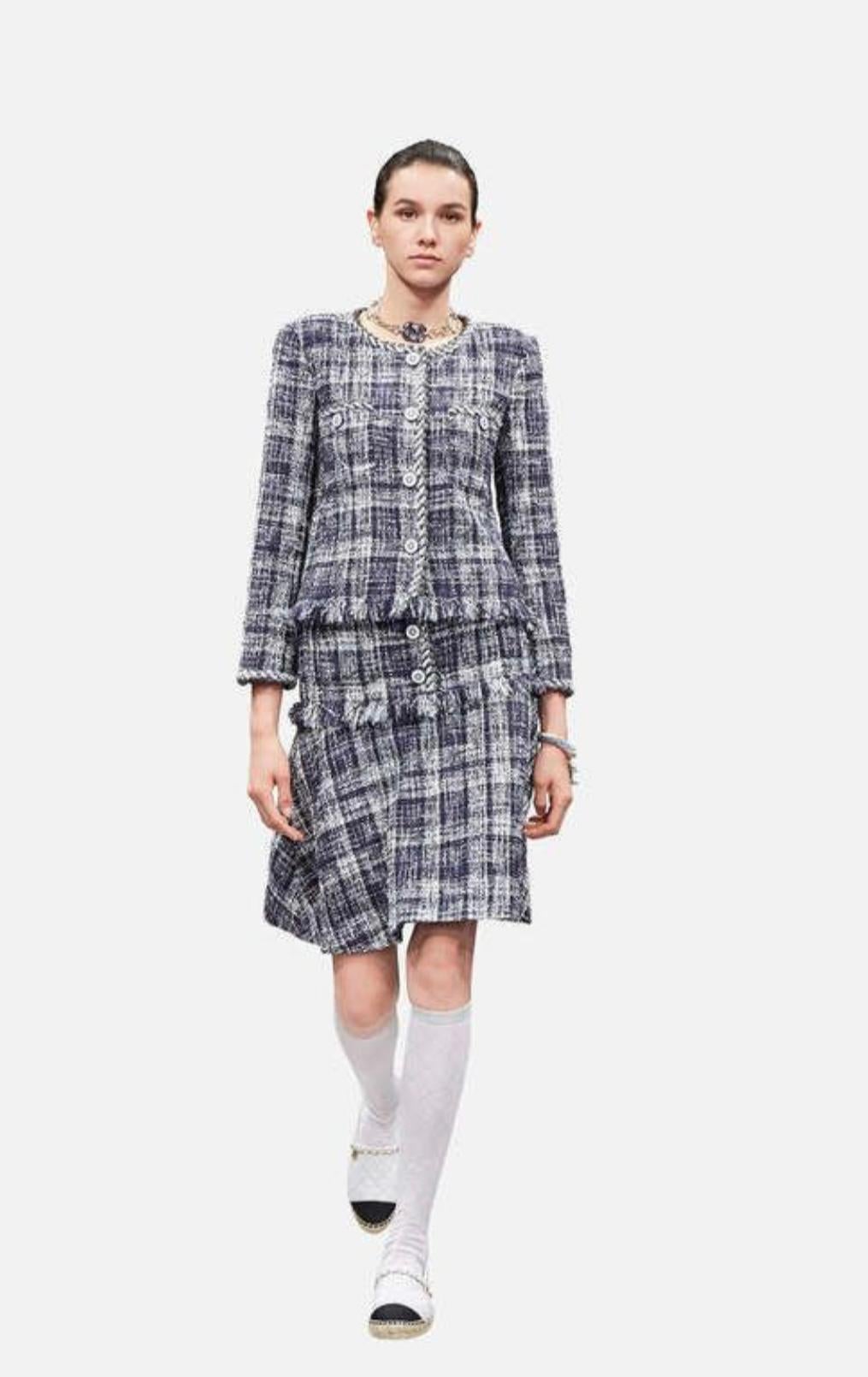 Famous Chanel navy tweed skirt from 2018 spring collection, made of navy and white lesage tweed
As seen on many celebs and fashionistas!
Size mark  42 fr. Condition is pristine

