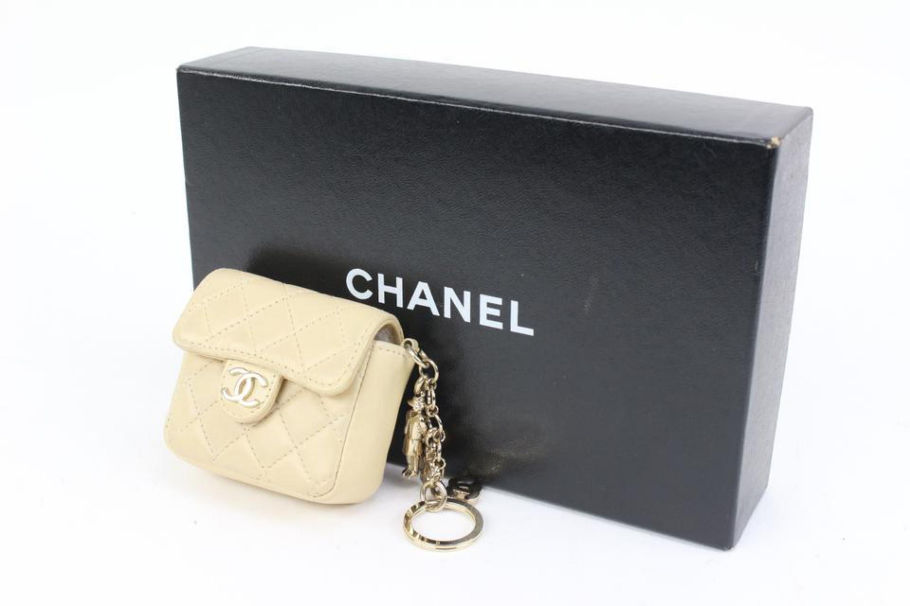 Chanel Light Beige Cream Quilted Leather Micro Flap Charm Bag Mini 48cz47
Date Code/Serial Number: 7441289
Made In: France
Measurements: Length:  3