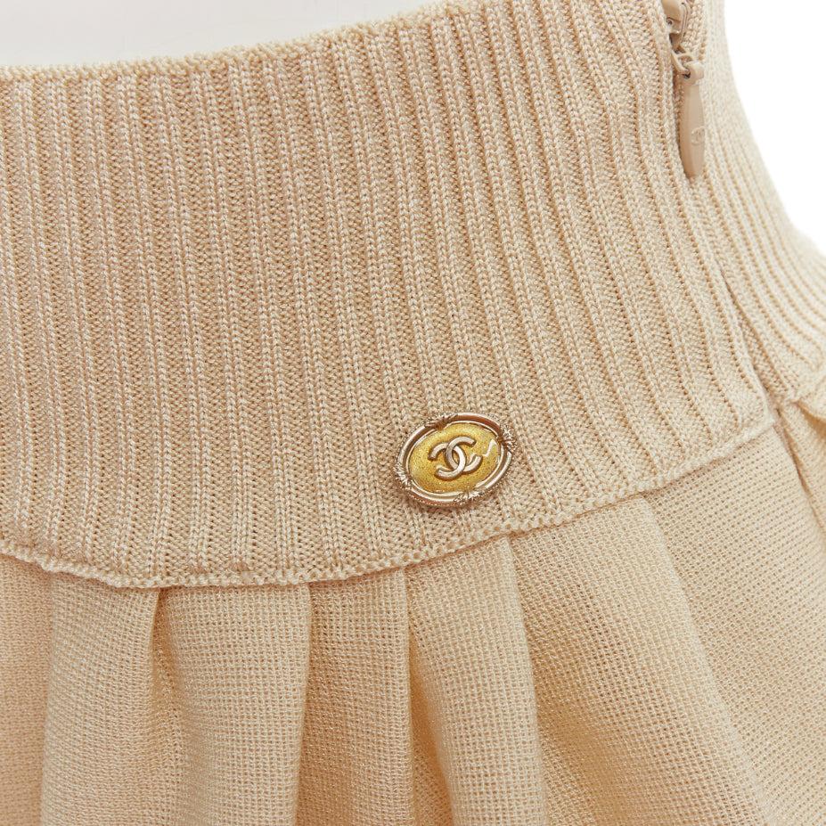 CHANEL light beige gold CC logo button flared skater skirt FR40 L
Reference: TGAS/E00147
Brand: Chanel
Designer: Karl Lagerfeld
Material: Viscose, Blend
Color: Cream, Gold
Pattern: Solid
Closure: Zip
Lining: Beige Fabric
Extra Details: Side zip.
