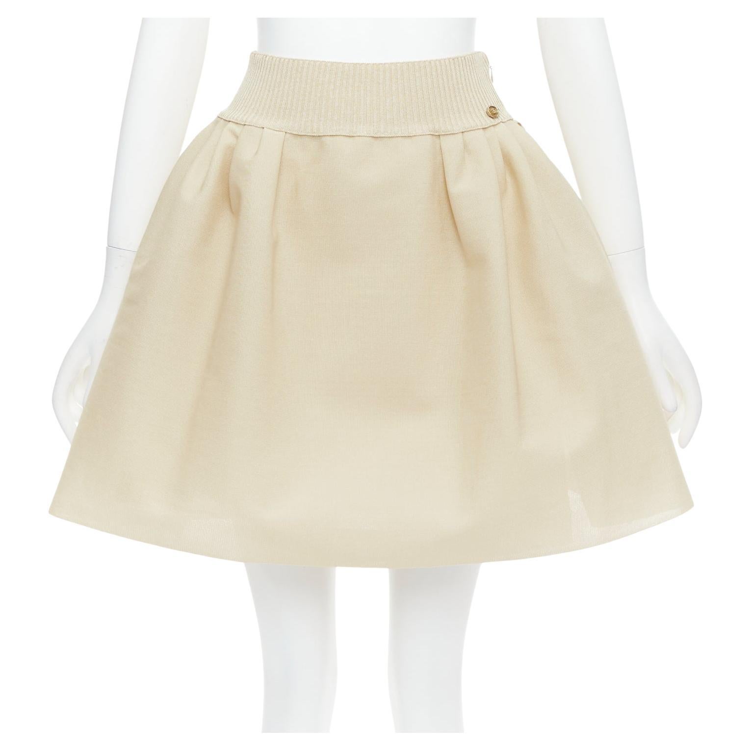CHANEL light beige gold CC logo button flared skater skirt FR40 L For Sale