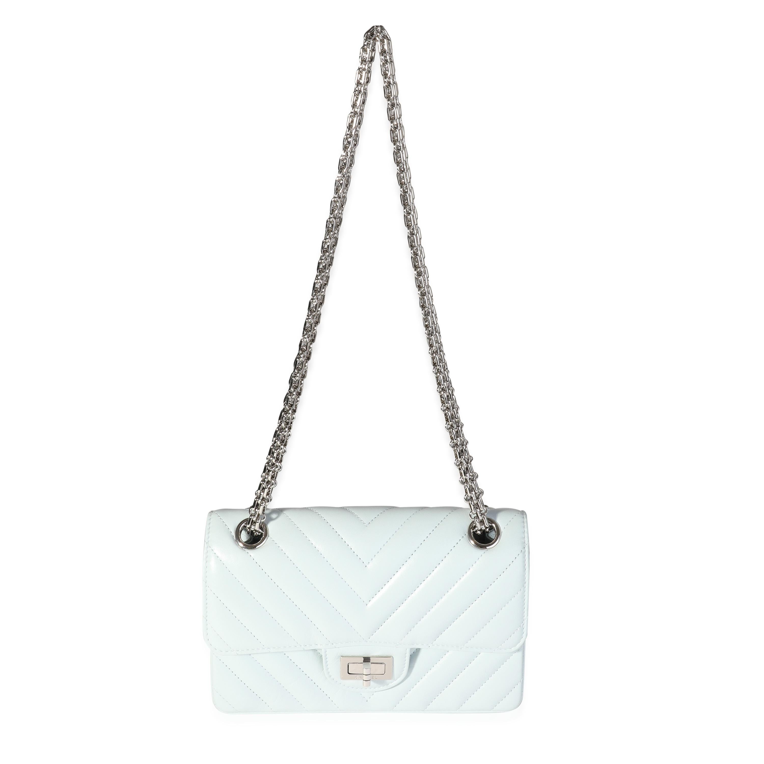 Listing Title: Chanel Light Blue Chevron Quilted Aged Calfskin Mini 2.55 Reissue Flap Bag
SKU: 118588
Condition: Pre-owned (3000)
Handbag Condition: Never Worn
Brand: Chanel
Model: Light Blue Chevron Aged Calfskin Mini 2.55 Reissue Flap Bag
Origin