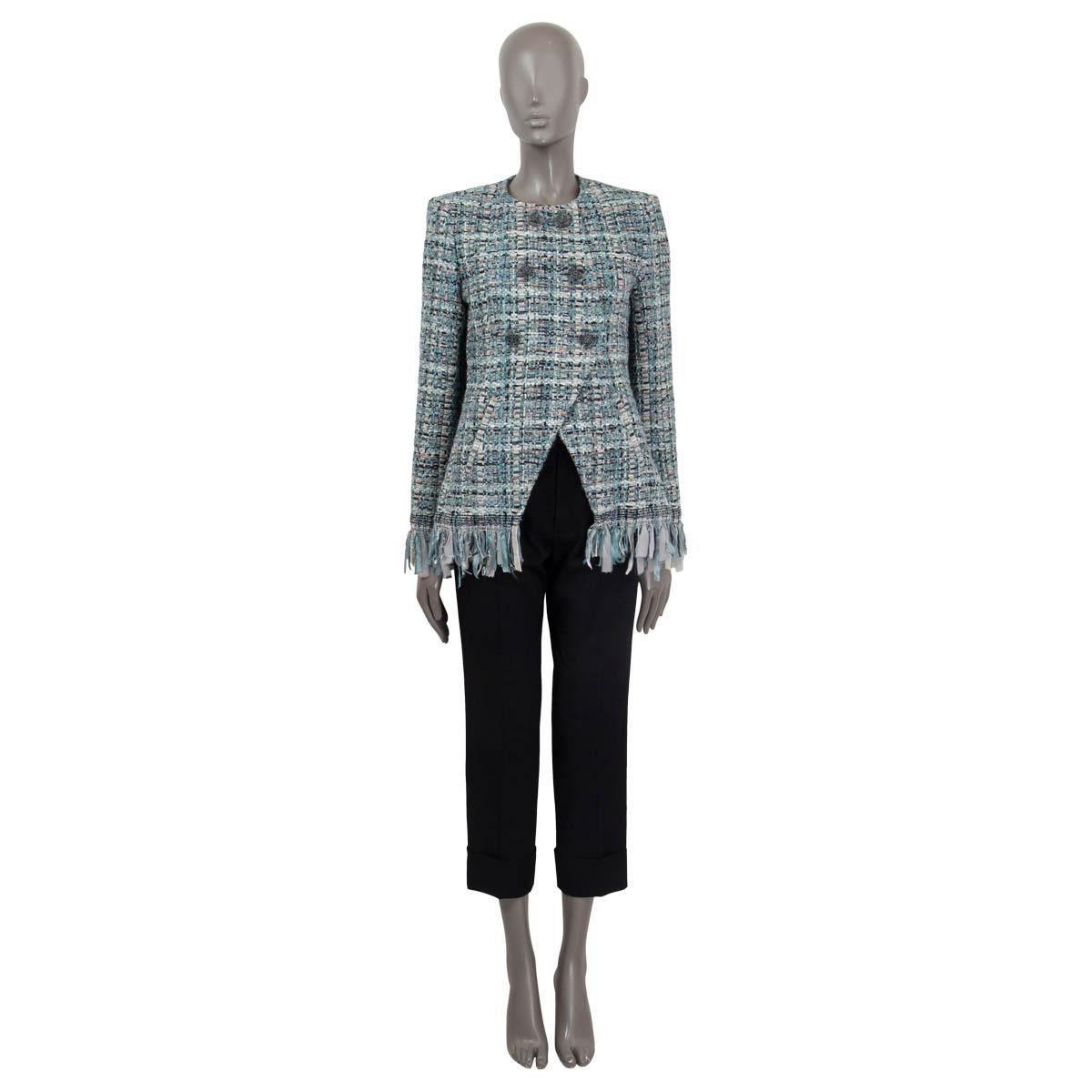 100% authentic Chanel Cosmopolite double breasted boucle blazer in light blue, turquoise, navy, blue, pink, off white and gray cotton (43%), nylon (24%), wool (13%), polyester (13%), acrylic (3%), linen (2%) and alpaca (2%). Features padded