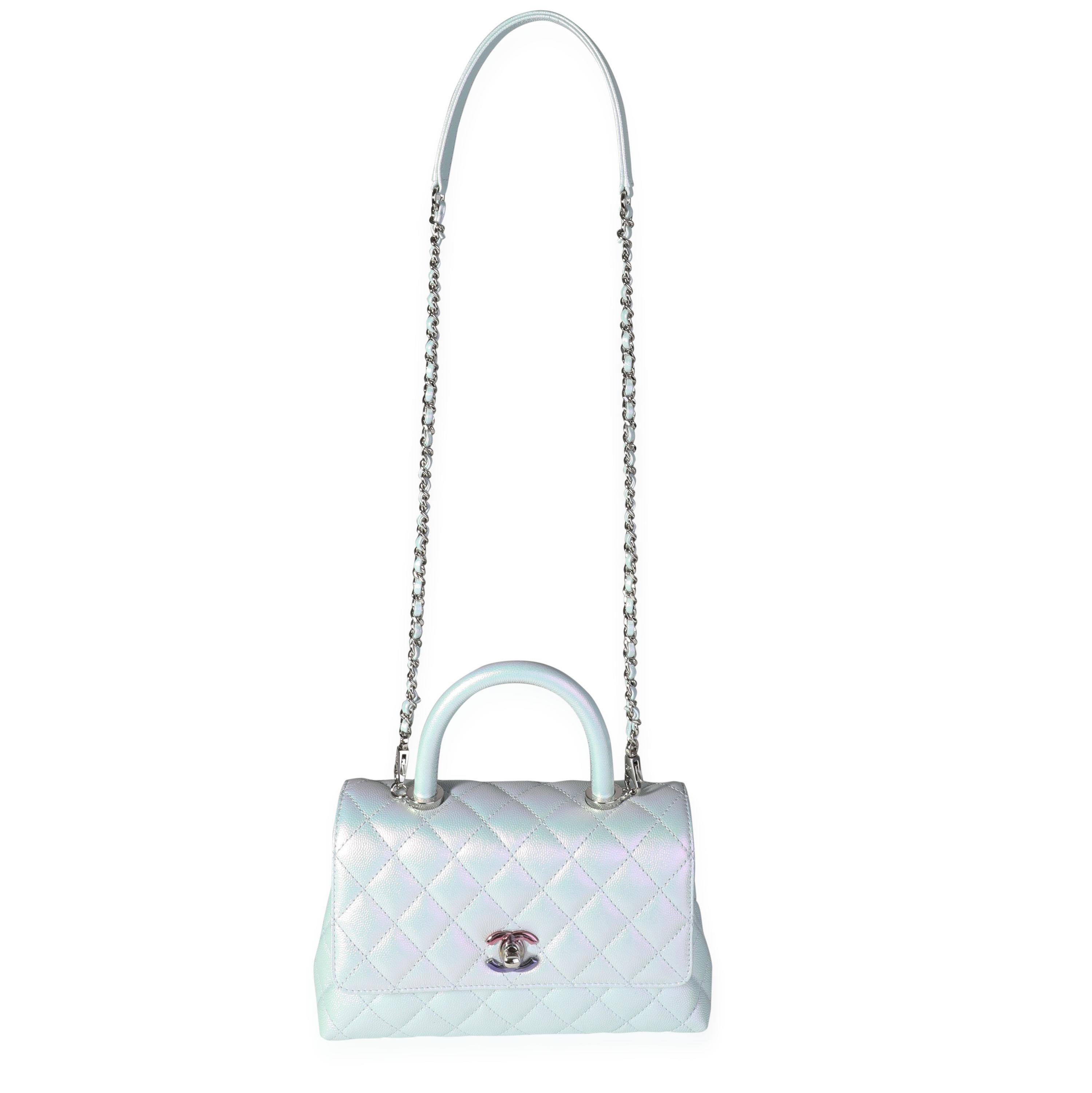 Listing Title: Chanel Light Blue Iridescent Quilted Caviar Small Coco Top Handle Bag
SKU: 117767
Condition: Pre-owned (3000)
Handbag Condition: Mint
Condition Comments: Mint Condition. Plastic on hardware. No visible signs of wear. Final