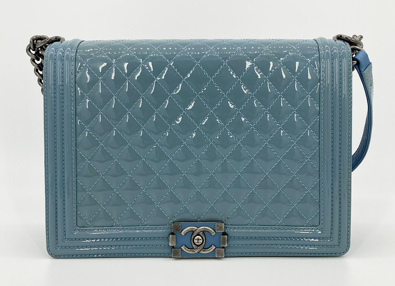 Chanel Light Blue Patent Large Boy Bag in good condition. Light blue patent leather trimmed with ruthenium hardware in signature le boy classic flap style. Front pinch latch closure opens via single flap to a blue patent and nylon interior with one