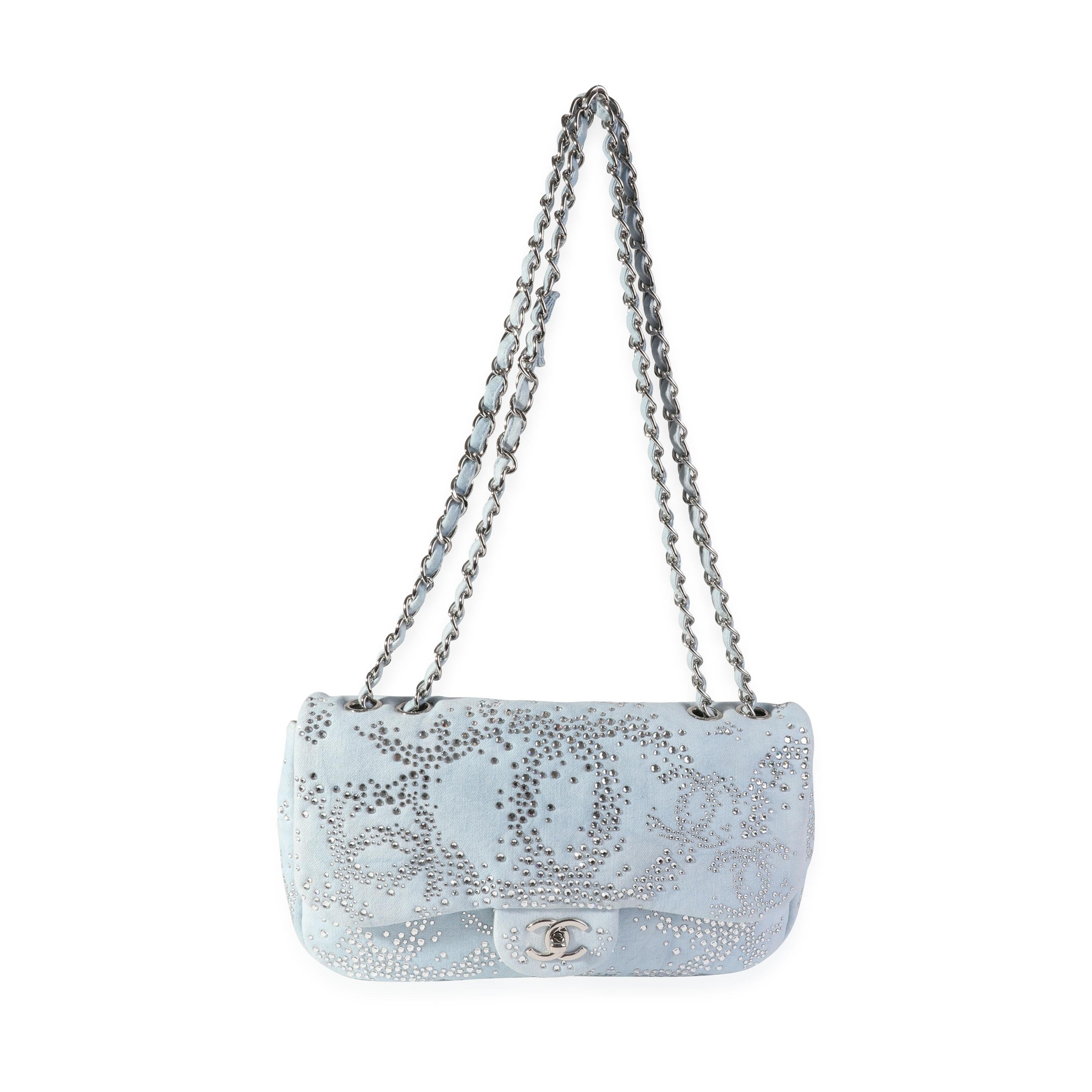 Listing Title: Chanel Light Blue Quilted Denim Swarovski Crystal Single Flap Bag
SKU: 118468
Condition: Pre-owned (3000)
Handbag Condition: Very Good
Condition Comments: Very Good Condition. Discoloration and light glue residue throughout exterior