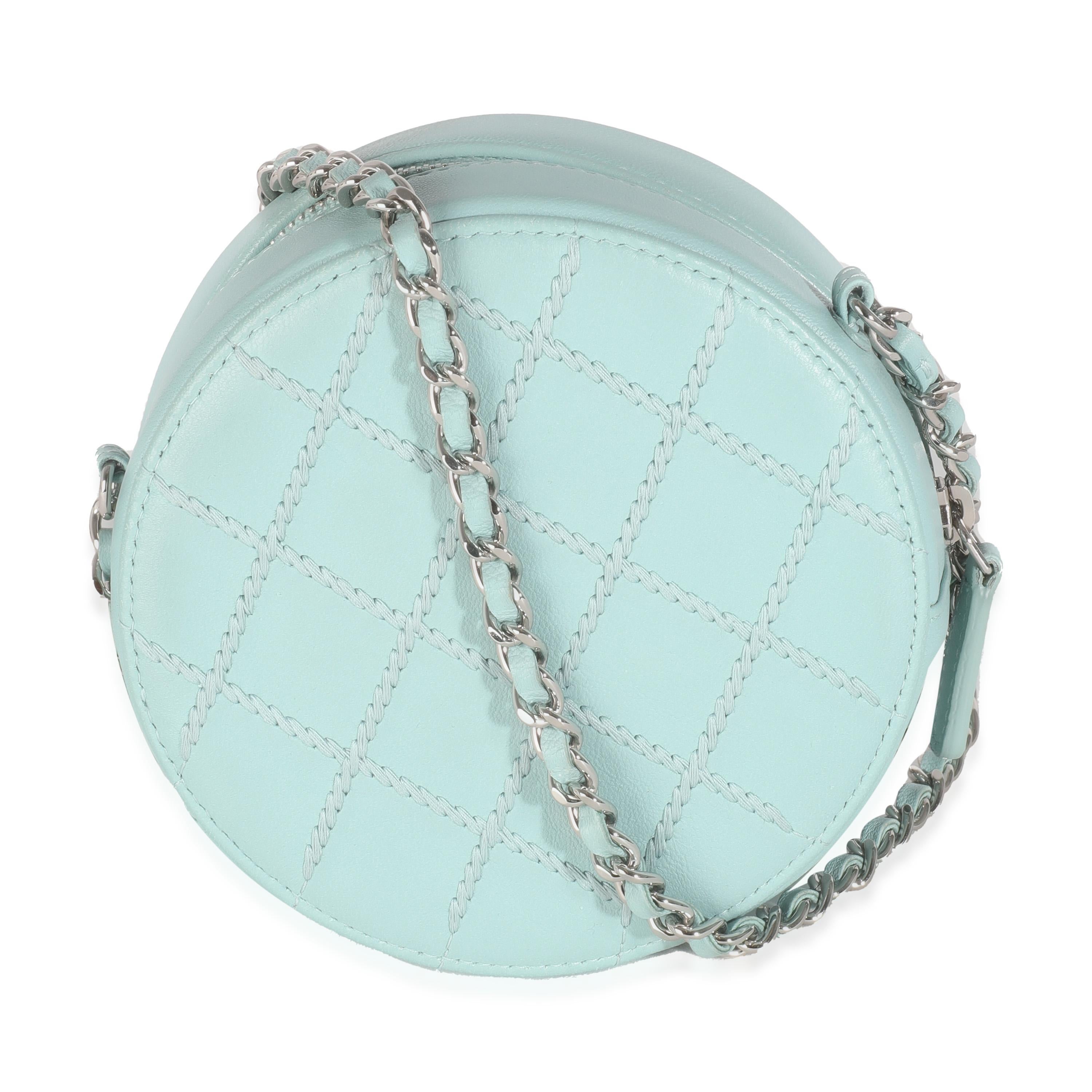 Listing Title: Chanel Light Blue Quilted Lambskin Round Clutch On Chain
SKU: 143486
Condition: Pre-owned 
Handbag Condition: Excellent
Condition Comments: Item is in excellent condition and displays light signs of wear. Scuffing along exterior
