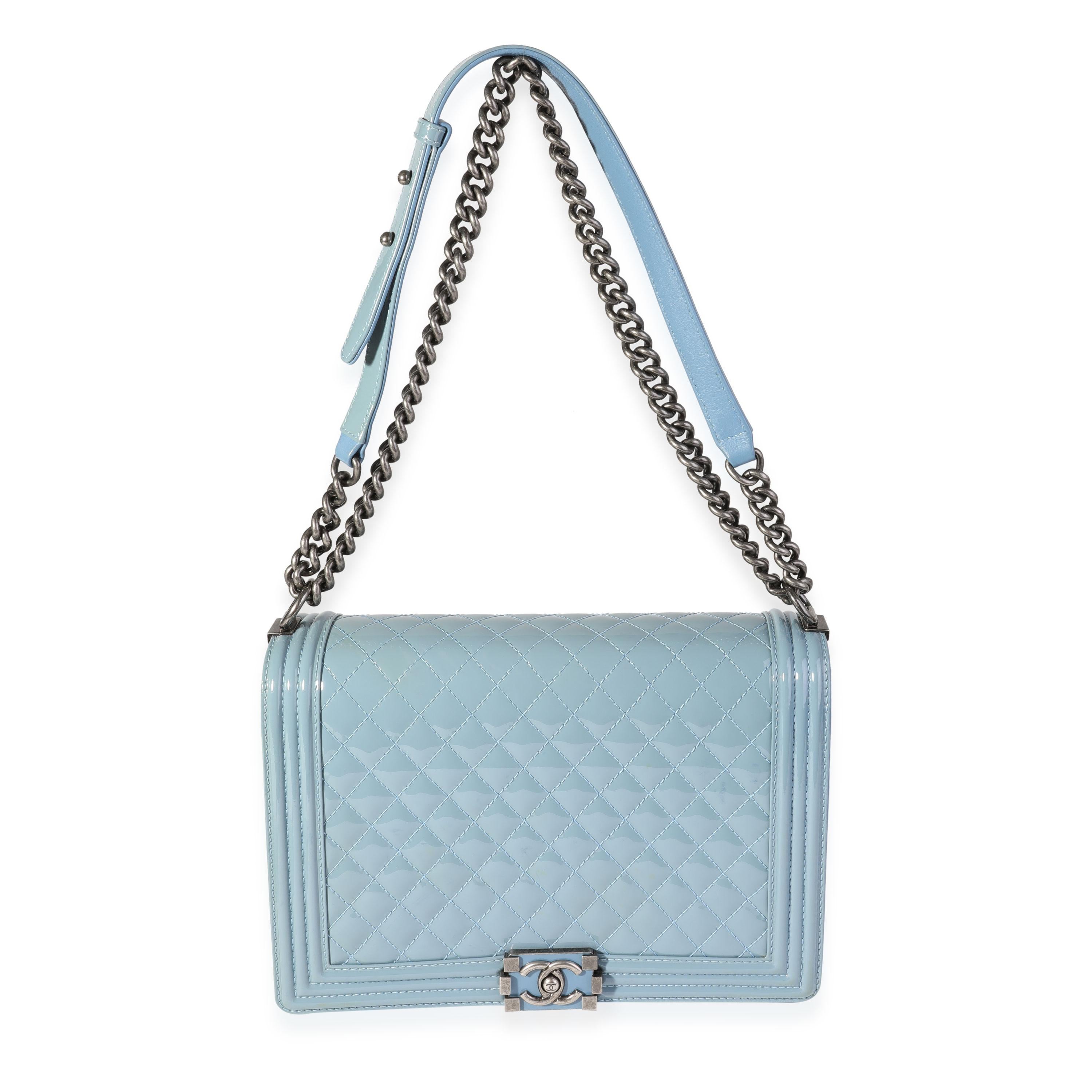 Listing Title: Chanel Light Blue Quilted Patent Leather Large Boy Bag
SKU: 120762
Condition: Pre-owned 
Handbag Condition: Good
Condition Comments: Good Condition. Discoloration throughout. Scuffing to exterior corners and interior.
Brand: