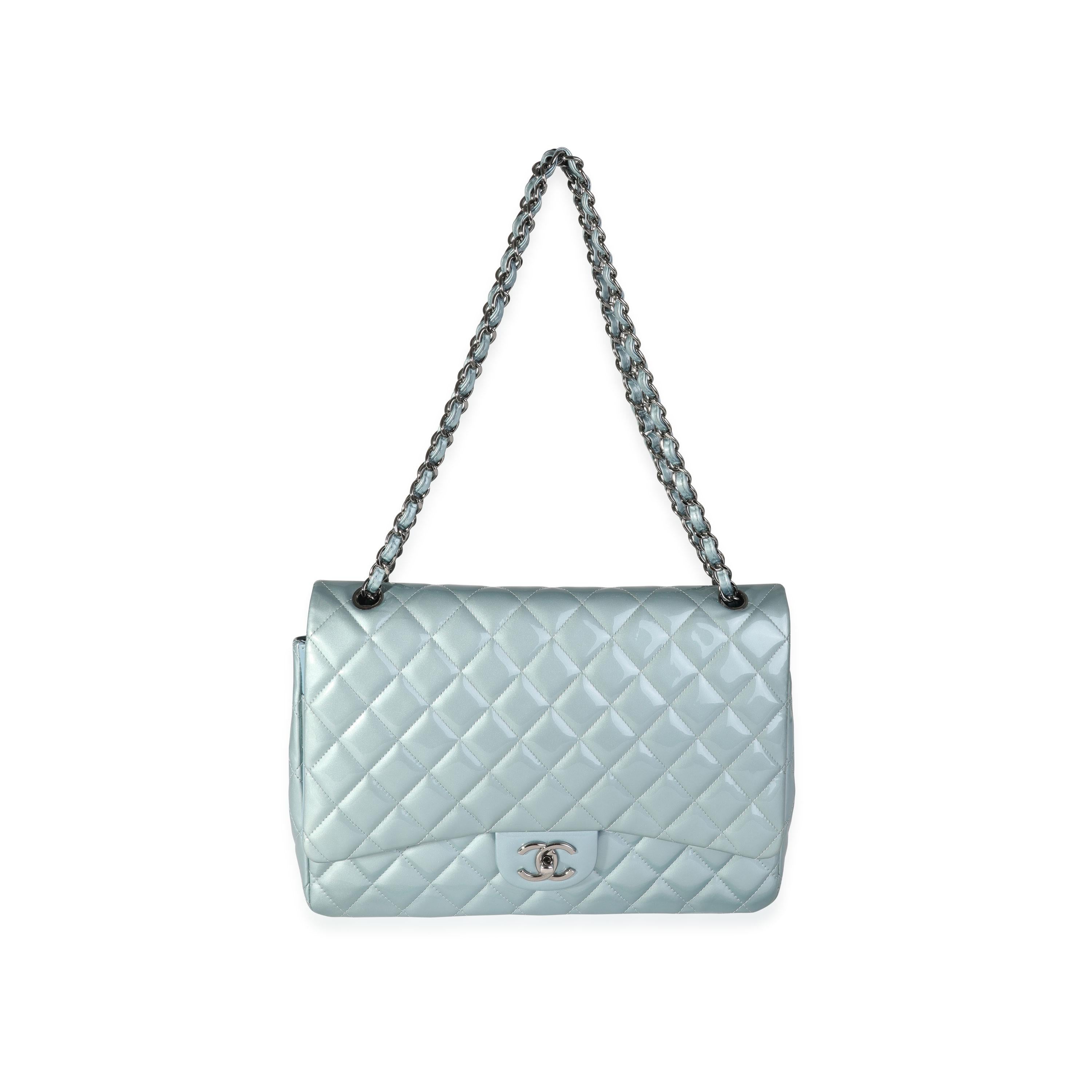 Listing Title: Chanel Light Blue Quilted Patent Leather Maxi Classic Double Flap
SKU: 118418
MSRP: 10000.00

Handbag Condition: Very Good
Condition Comments: Very Good Condition. Scuff at back corner. Interior shows signs of use.
Brand:
