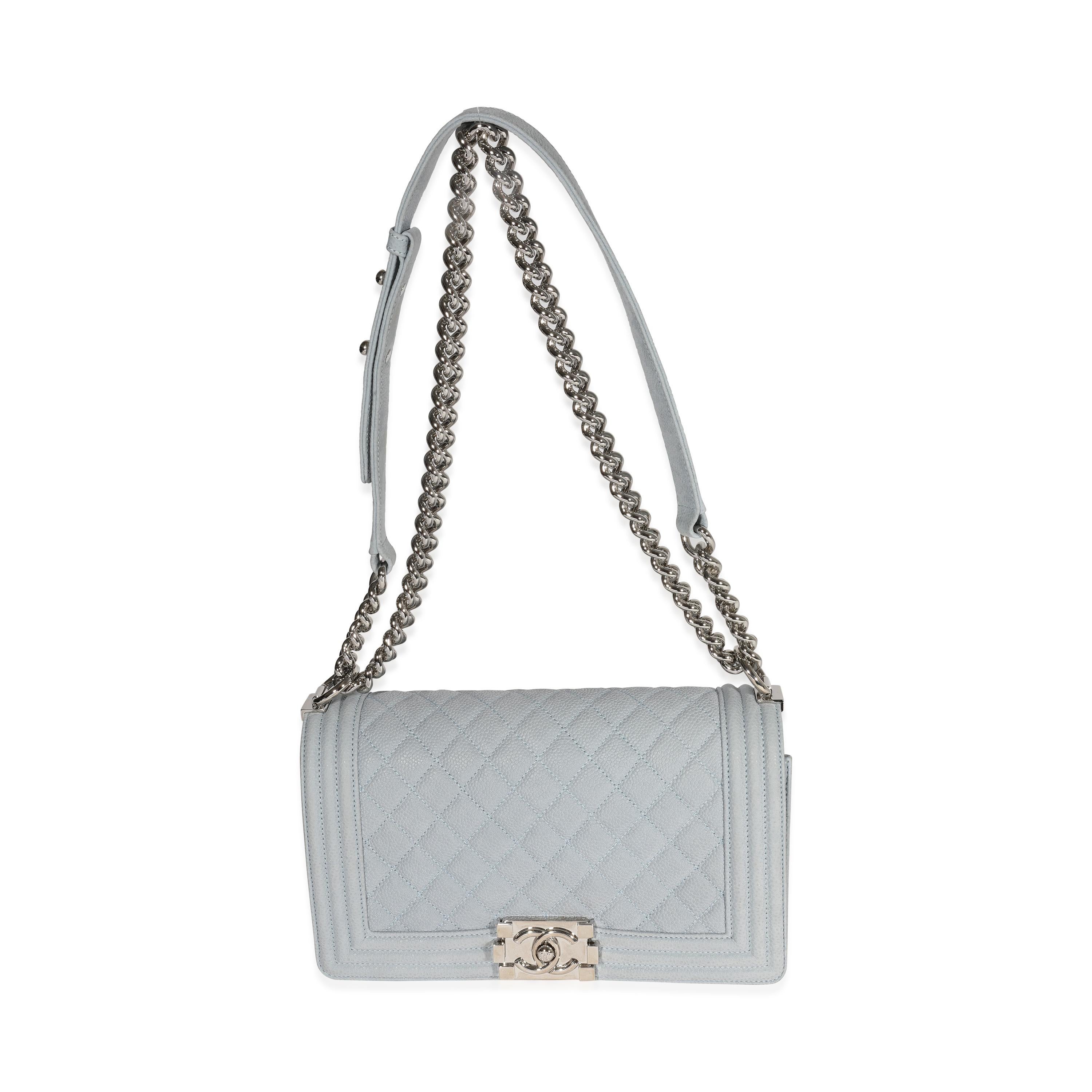 Listing Title: Chanel Light Blue Quilted Washed Caviar Old Medium Boy Bag
SKU: 122498
Condition: Pre-owned 
Handbag Condition: Very Good
Condition Comments: Very Good Condition. Exterior scuffing, marks and discoloration. Some wear at piping.