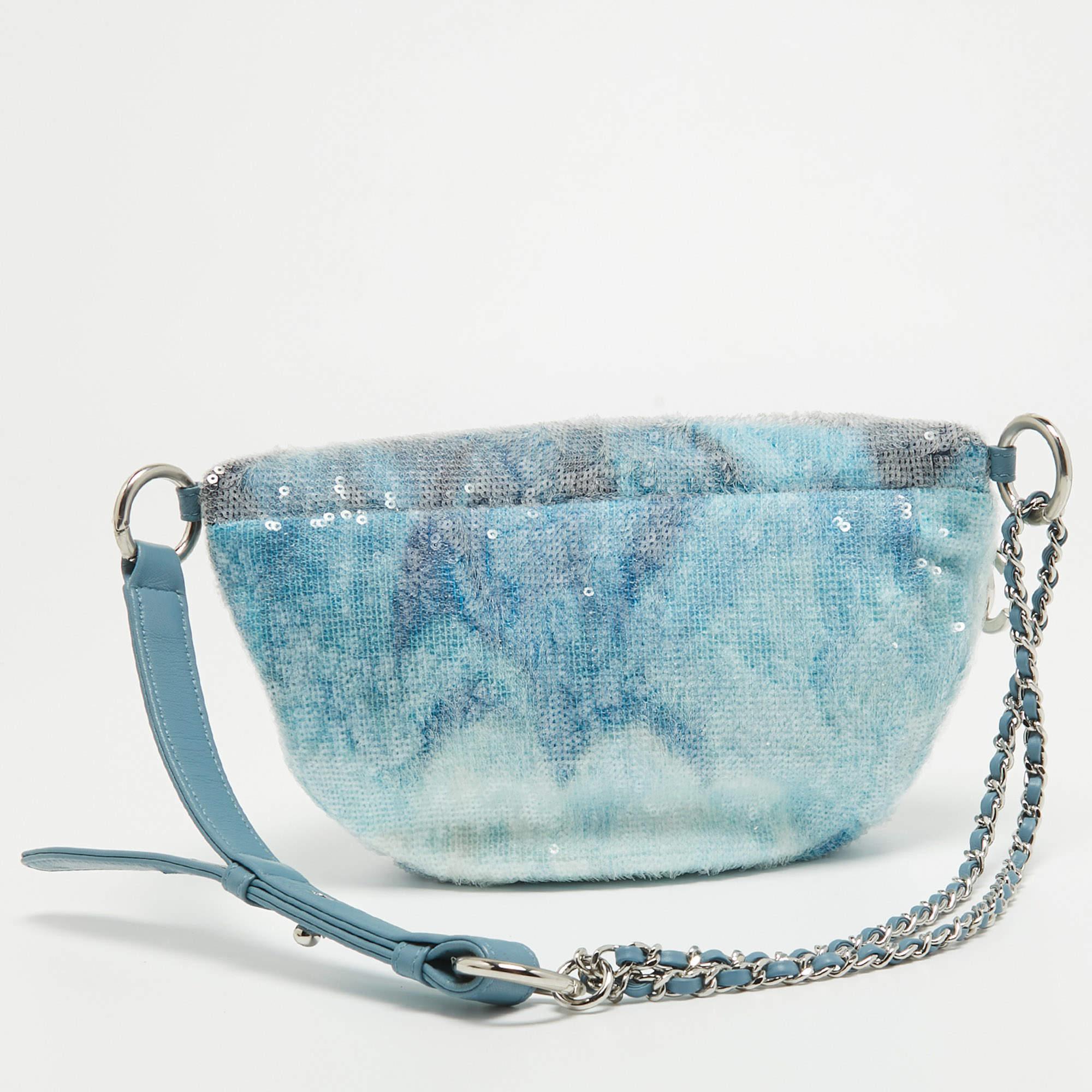 This uber-stylish Chanel Waterfall belt bag aims to be an elevating piece. It is carefully covered in sequins and its light blue hue evokes timeless beauty. See how it transforms a T-shirt dress or a solid jumpsuit!

Includes: Authenticity Card
