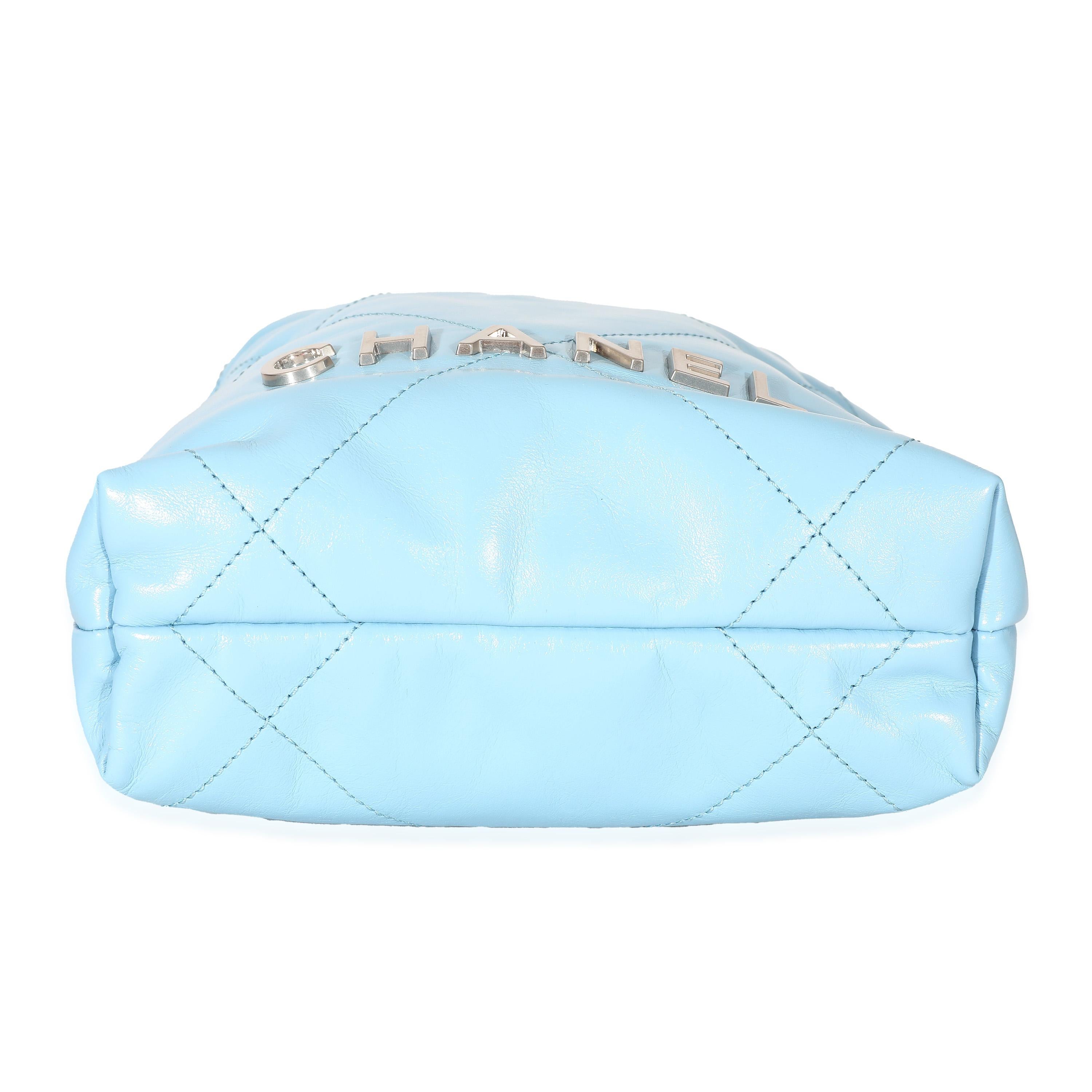 Listing Title: Chanel Light Blue Shiny Quilted Calfskin Mini 22
SKU: 134033
Condition: Pre-owned 
Handbag Condition: Excellent
Condition Comments: Item is in excellent condition and displays light signs of wear. Faint interior scuffing.
Brand: