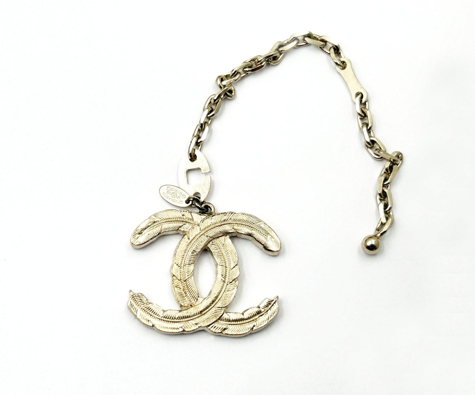 Artisan Chanel Light Gold CC Feather Large Pendant Key Chain Key Charm For Sale