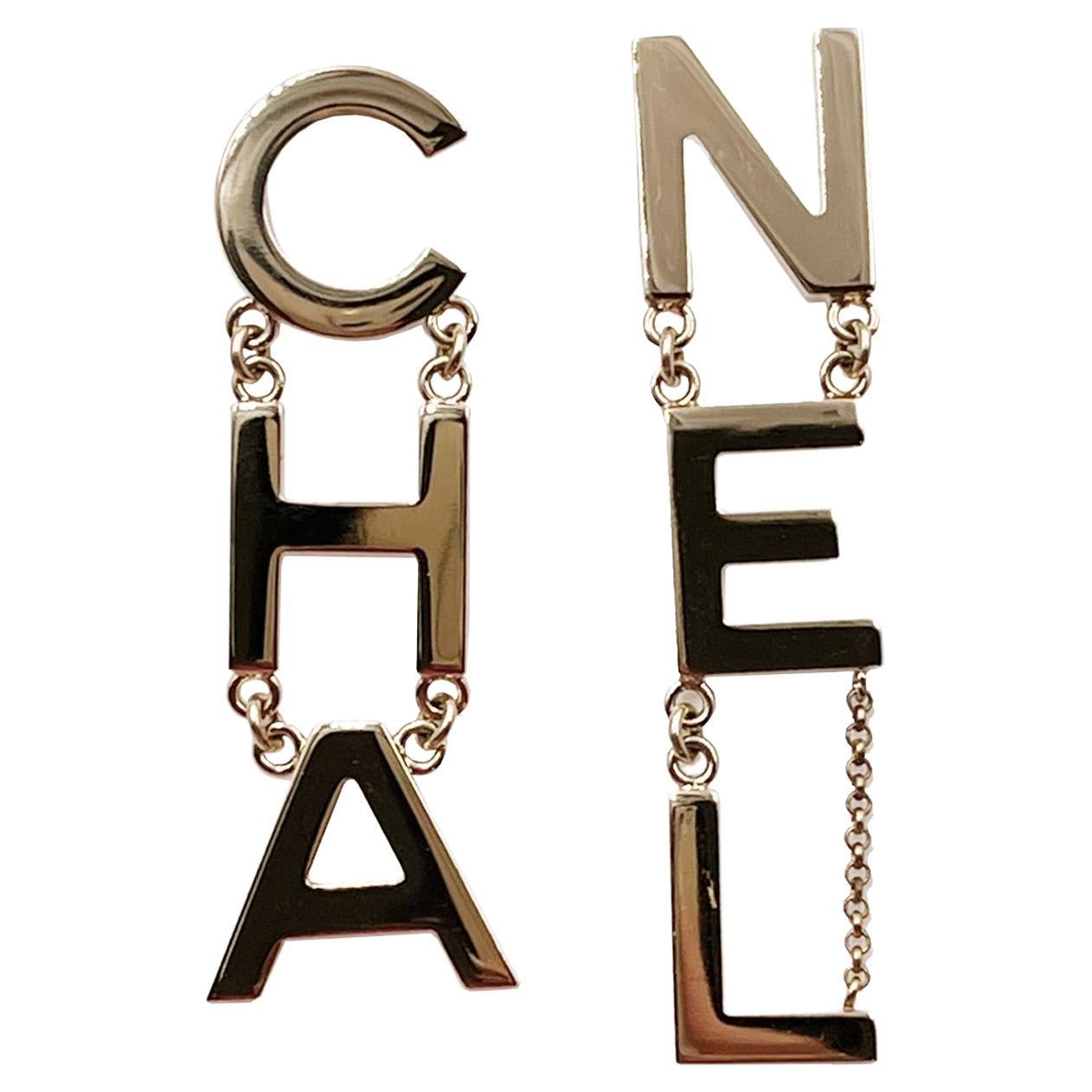 Chanel Light Gold Letter Long Piercing Earrings   For Sale