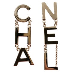 Chanel Light Gold Letter Long Piercing Earrings  