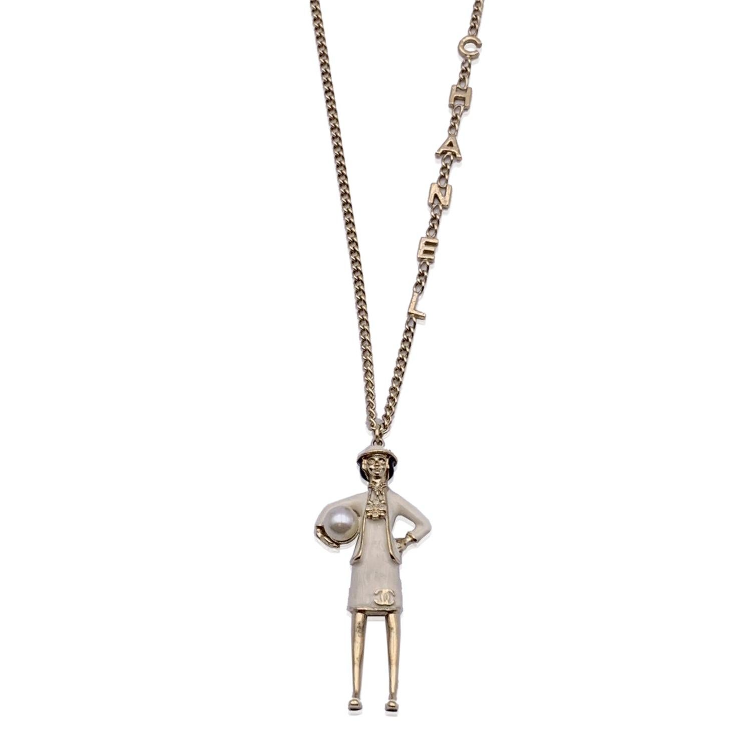 Chanel Light Gold Metal Coco Mademoiselle Figurine Pendant Necklace In Excellent Condition In Rome, Rome