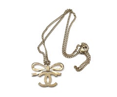 Chanel Classic  Light Gold Ribbon Bow CC Necklace