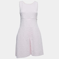 Chanel Hellrosa gestricktes ärmelloses ausgestelltes Minikleid mit Blumenprägung M