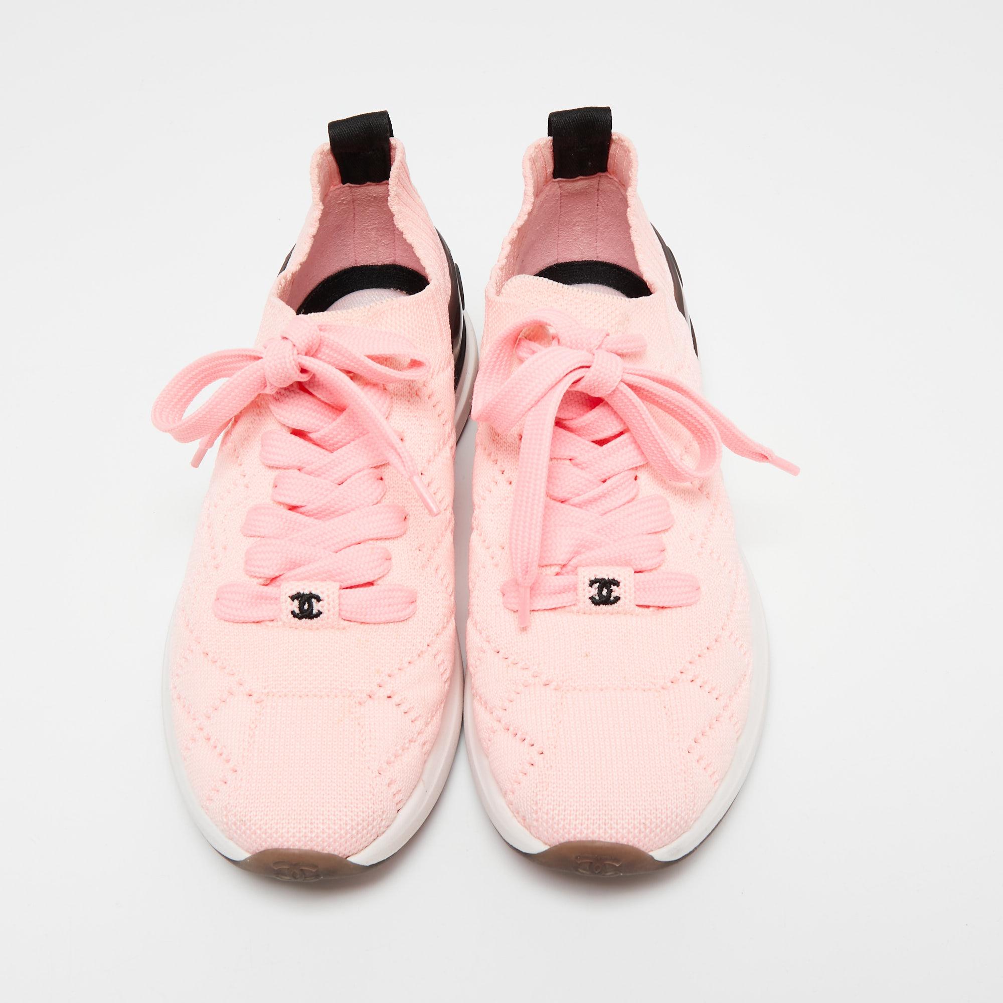 A desirable creation in light pink, these Chanel sneakers will keep on top of the trends. They are created from knit fabrics with a brand signature on the lace-up vamps, pull tabs at the counters, and rubber soles.

Includes: Original Dustbag

