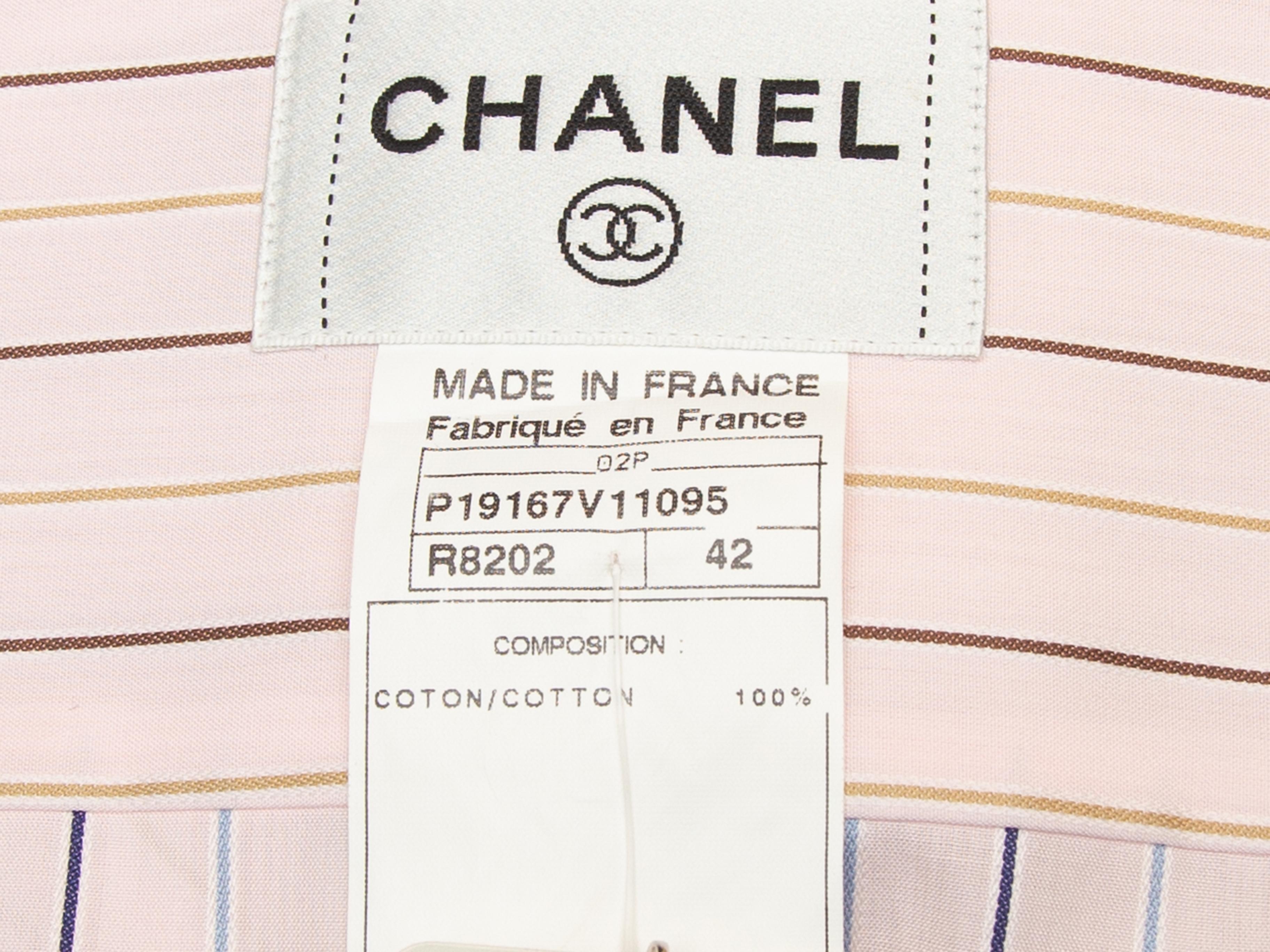 Product details: Light pink and multicolor striped button-up top by Chanel. From the Spring 2002 Collection. Pointed collar. CC button closures at center front. Designer size 42. 40