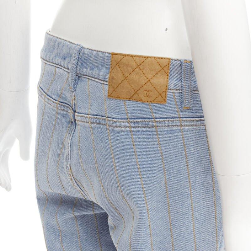 CHANEL light washed blue denim gold chain embroidery straight leg jeans FR40 M
Reference: KNLM/A00228
Brand: Chanel
Designer: Karl Lagerfeld
Model: P63151V48898
Material: Cotton, Elastane
Color: Blue, Gold
Pattern: Striped
Closure: Zip Fly
Extra