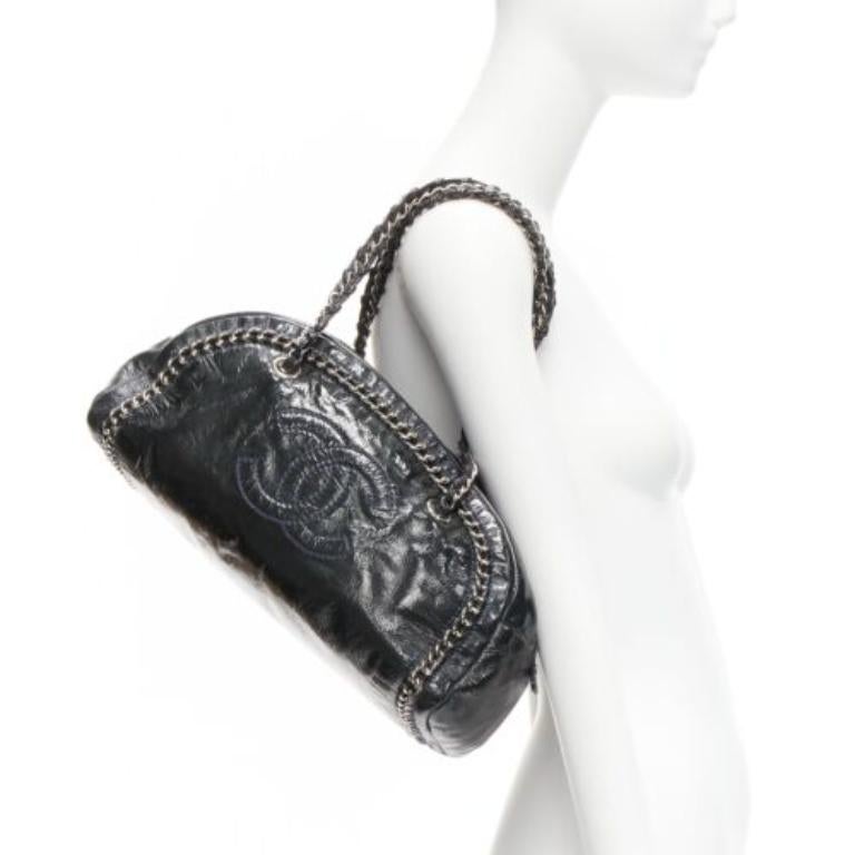 CHANEL Ligne Bowler black patent leather CC woven chain satchel bag
Reference: TGAS/D00768
Brand: Chanel
Designer: Karl Lagerfeld
Model: Ligne Bowler
Material: Patent Leather, Metal
Color: Black, Silver
Pattern: Solid
Closure: Zip
Lining: Silver