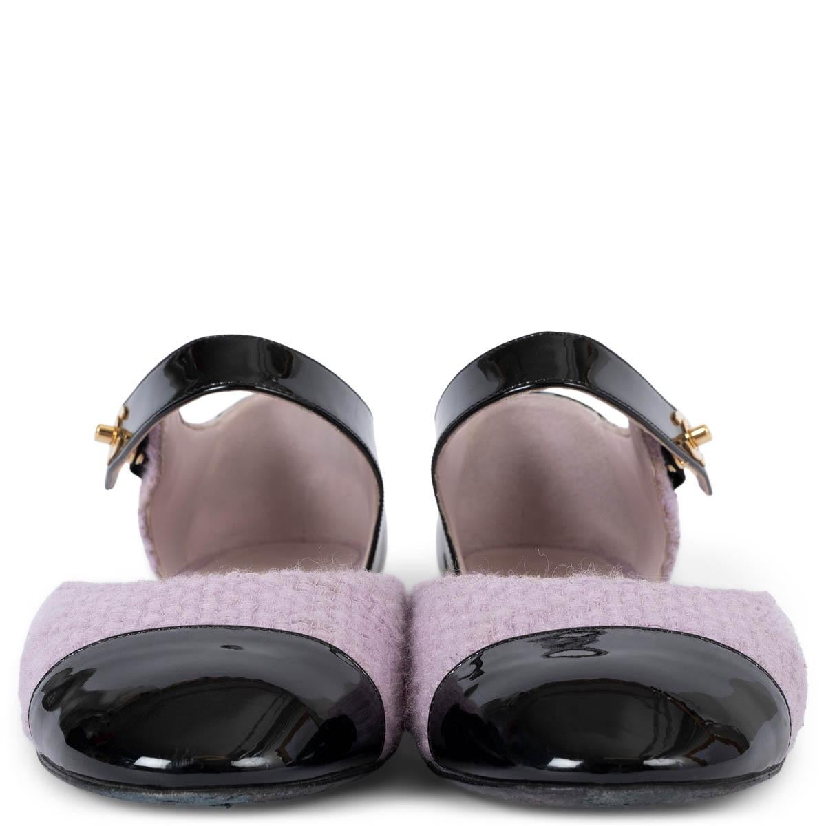 100% authentic Chanel Mary-Jane flats in lilac tweed with black patent leather cap toe, heel and strap. The design features a gold-tone CC turn-lock closure and golden heel. Have been worn and are in excellent condition. Come with dust bag. 

2021