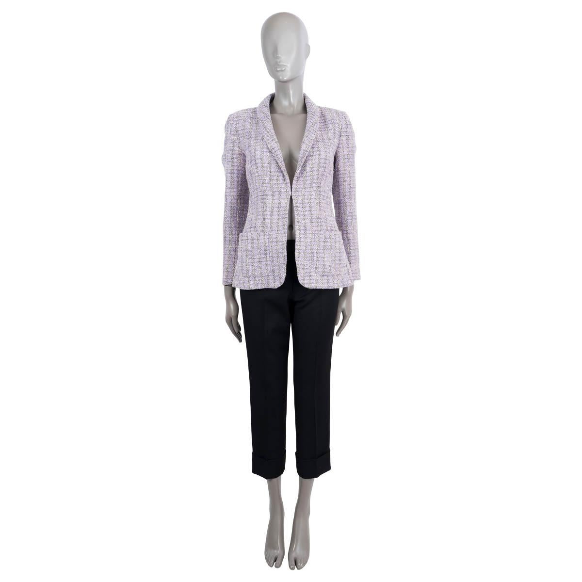 100% authentic Chanel iridescent tweed blazer in lilac, ivory and black cotton (42%), polyester (39%), nylon (10%) and viscose (9%). Features a shawl collar and two patch pockets on the front. Closes with a single concealed button. Lined in silk