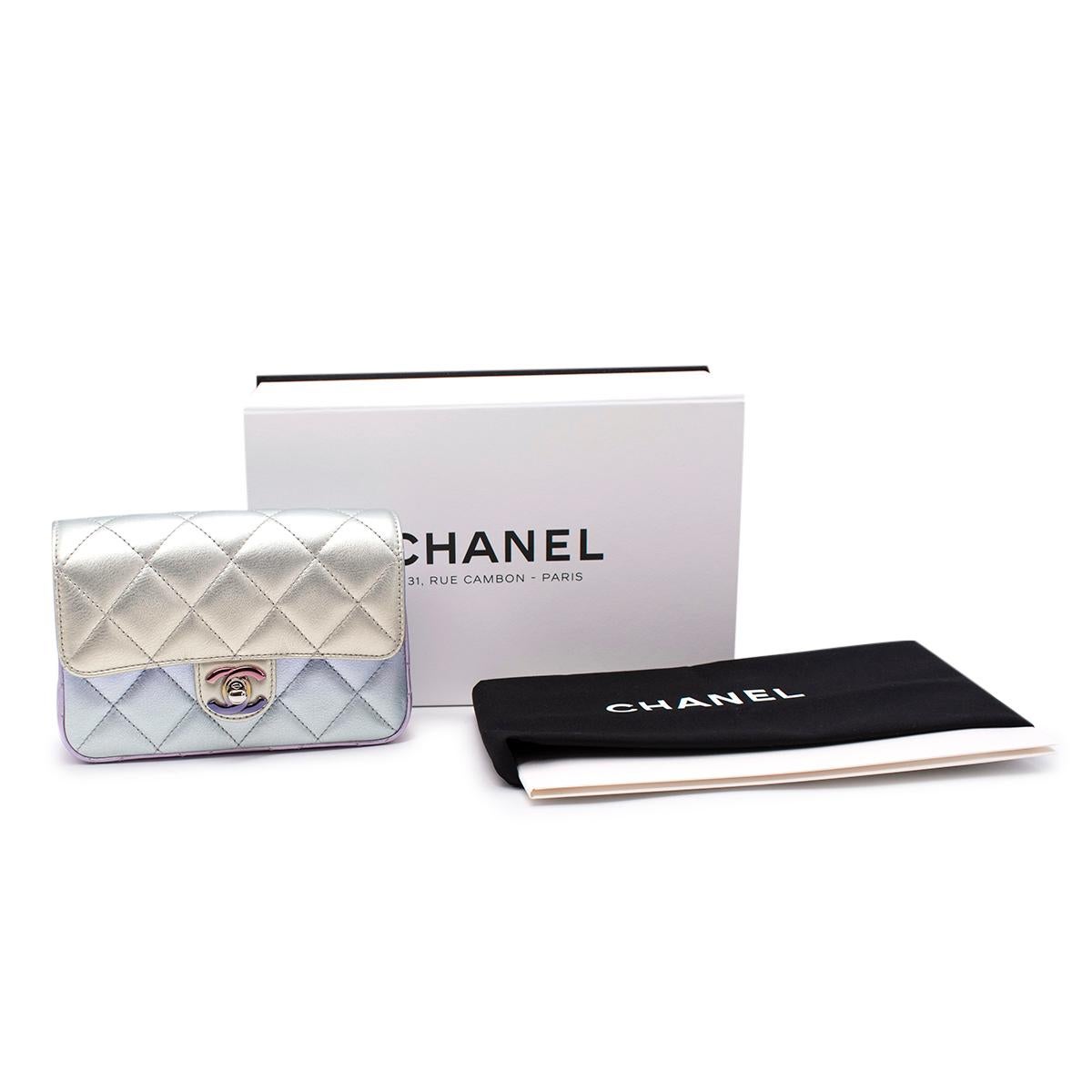 Chanel Lilac Iridescent Metallic Diamond Quilted Leather Minaudiere

- Stunning iridescent leather fading through a lilac-hued rainbow of tones including purple pink and sage green
- All-over signature diamond quilting in tonal thread
-Flap front