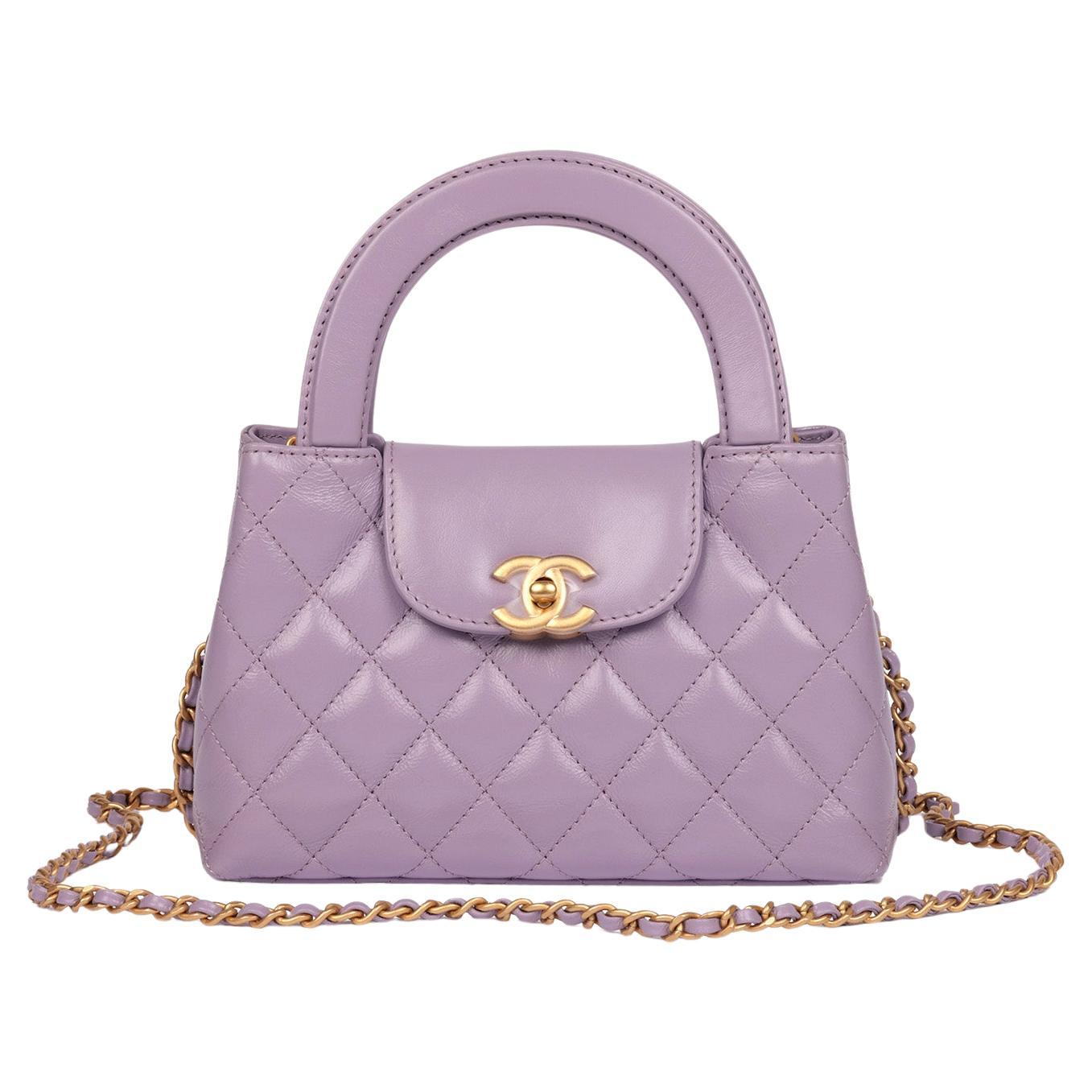 Chanel Bolso Kelly Nano Classic en piel de becerro acolchada lila en venta
