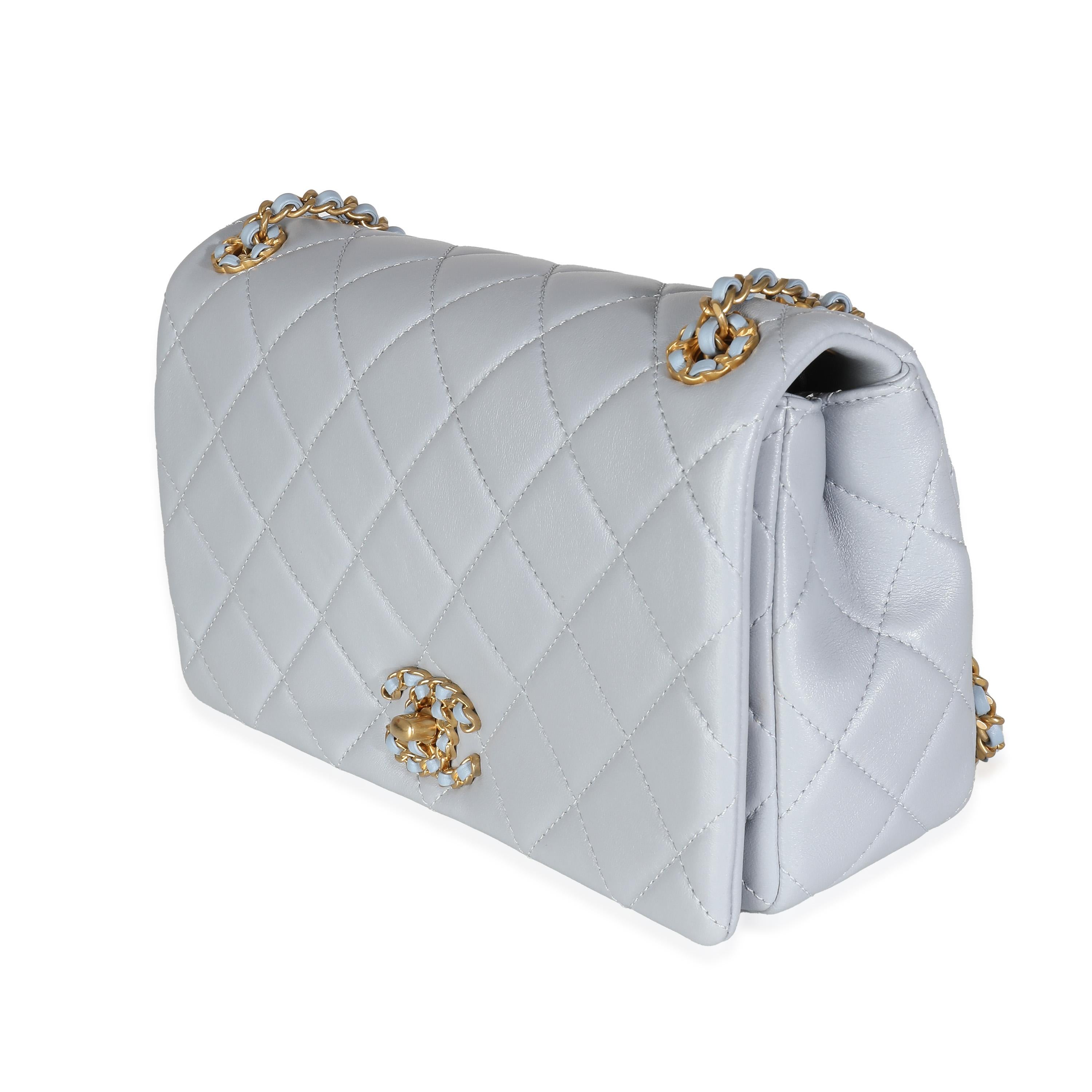 Listing Title: Chanel Lilac Quilted Lambskin Woven CC Full Flap Bag
SKU: 139778
Condition: Pre-owned 
Condition Description: A timeless classic that never goes out of style, the flap bag from Chanel dates back to 1955 and has seen a number of