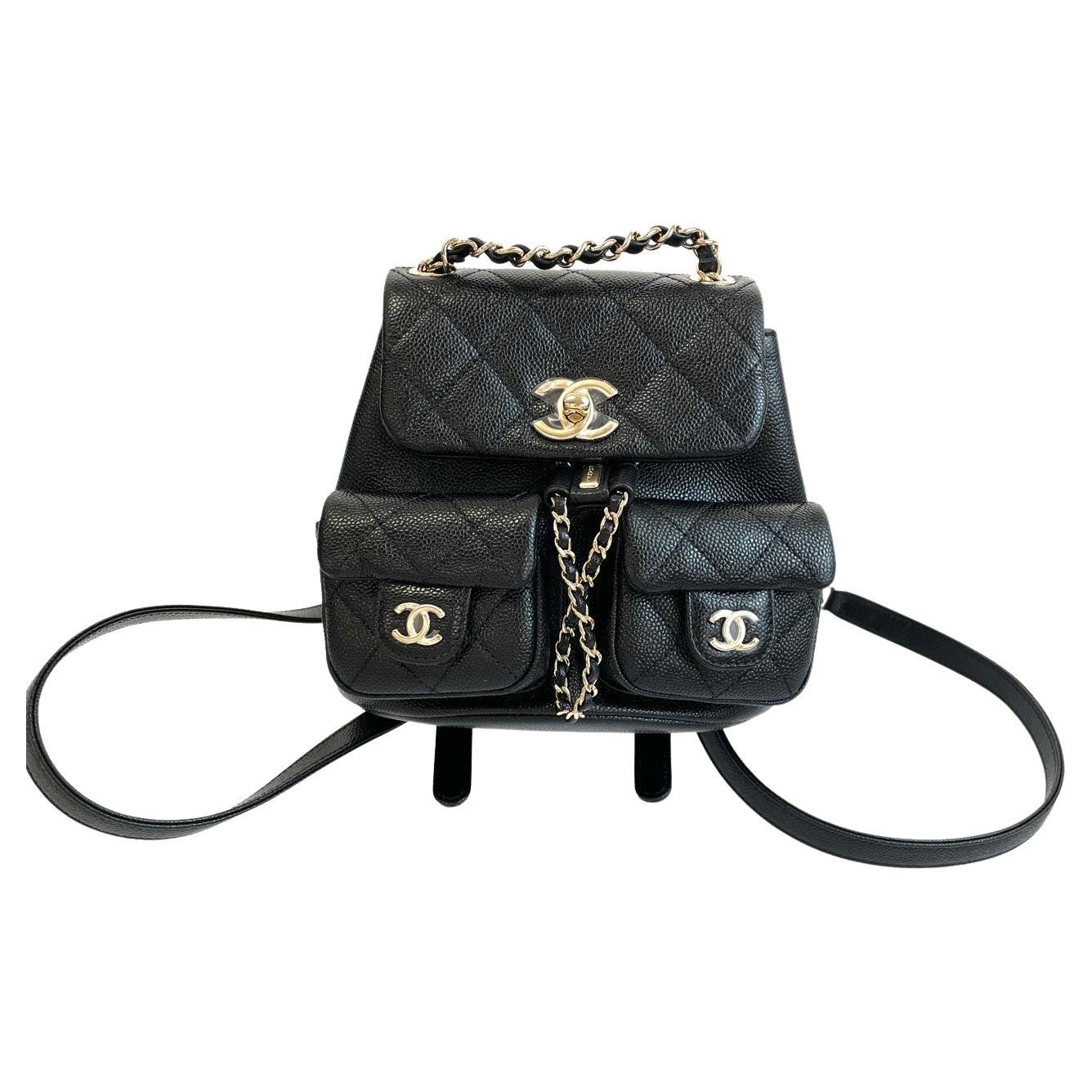 Chanel Limited Edition 2023 Caviar Small Mini Duma Backpack

2023
Silver hardware
Double CC turnlock closure
Two small front pockets
Interior leather lining
Drawstring bucket and CC turnlock closure
Adjustable straps
Flat bottom with CC stitched