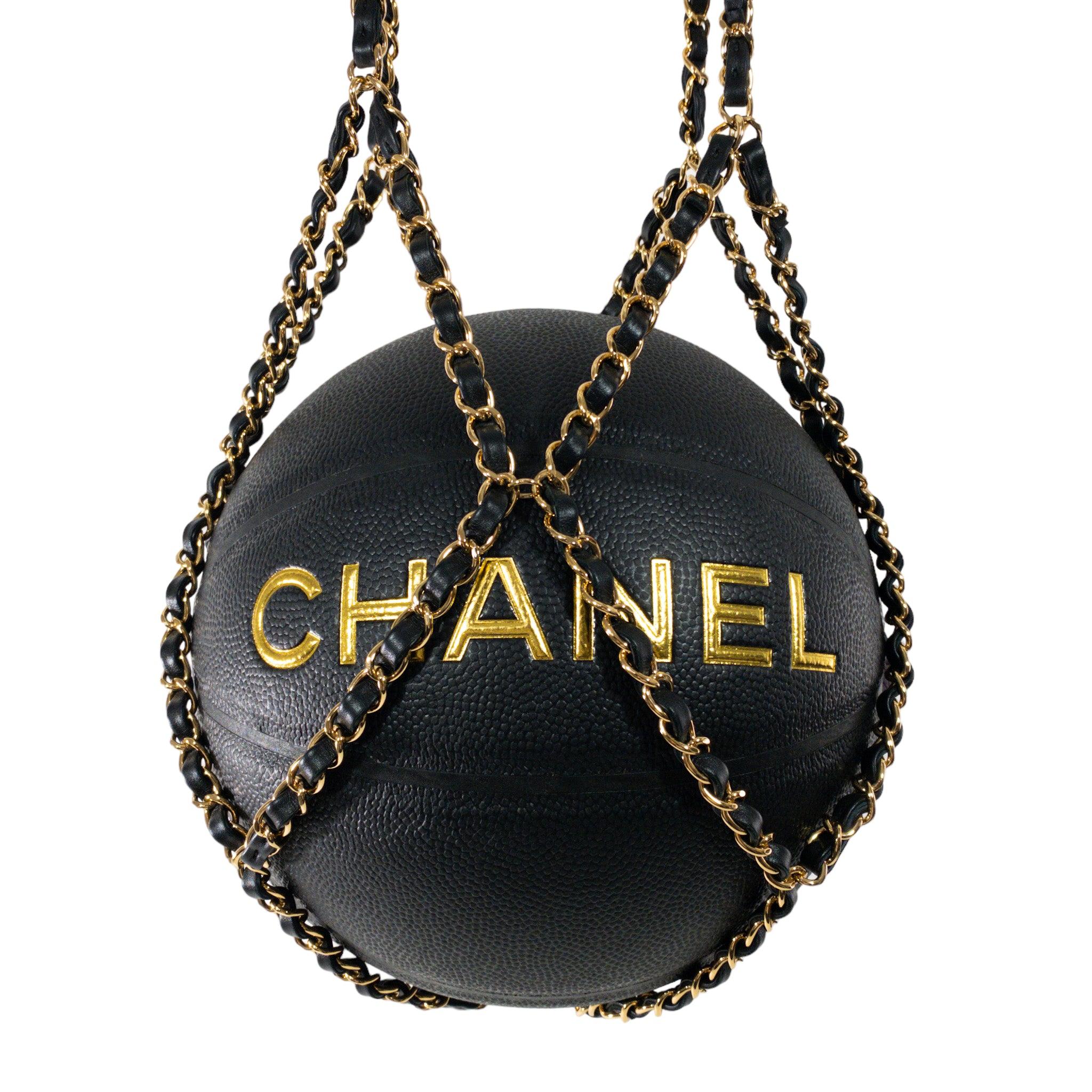 Chanel Limited Edition Basketball with Chain Harness, 2019

This is an authentic Collector's edition Chanel Basketball with woven chain harness. Leather handles on chain straps. Black Exterior with 'CHANEL' and 'CC' in gold paint.

Additional