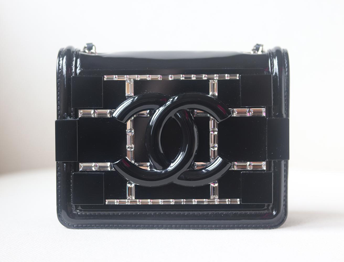 Chanel Limited Edition Boy Brick Crystal and Plexi Crossbody Bag has been hand-finished by skilled artisans in the label's workshop.
Boasting quilted patent-leather exterior, this design is accented with crystal embellishment on the front and black