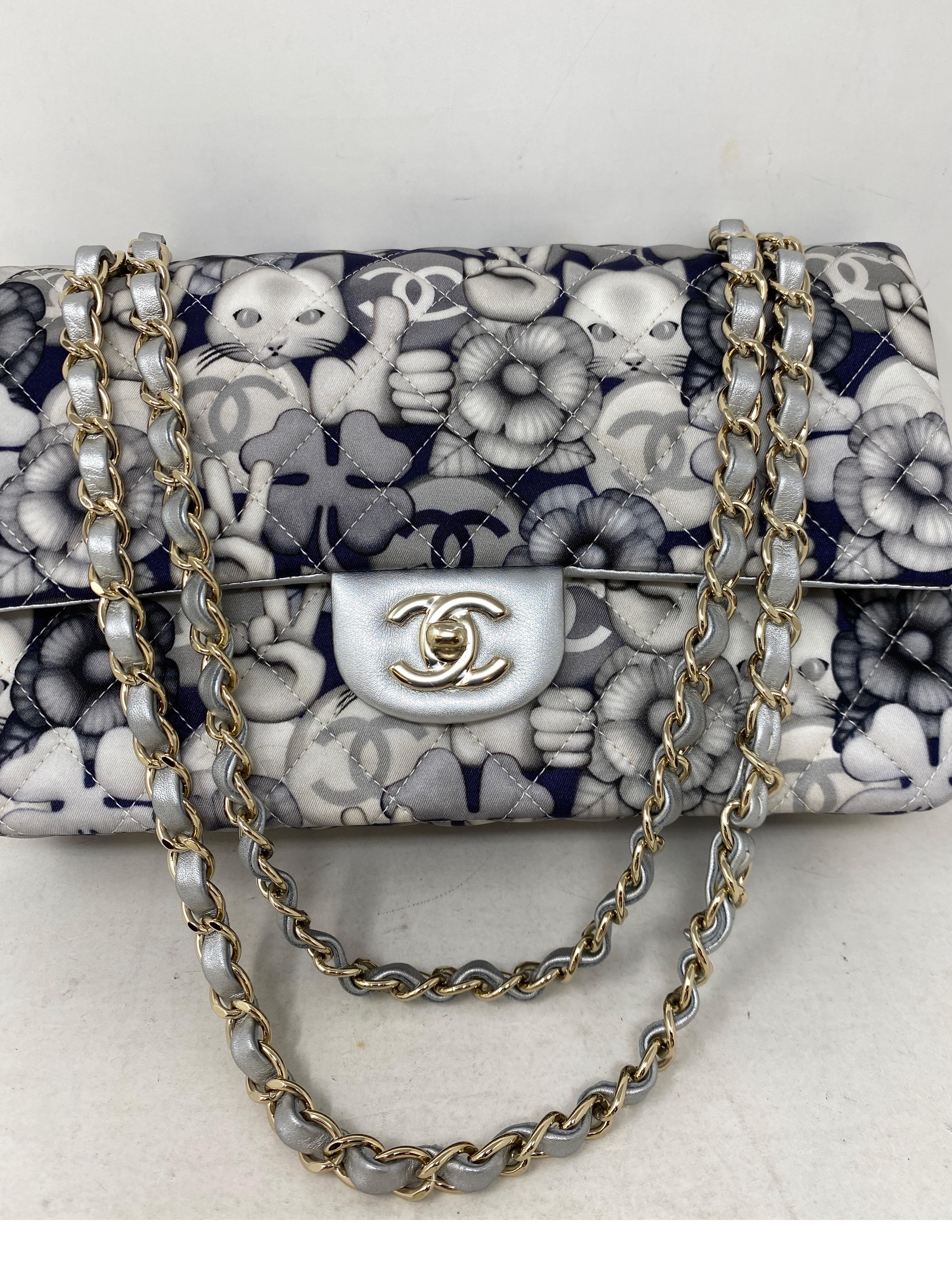 Chanel Limited Edition Cat Bag. Rare cat design fabric Chanel bag with leather trim and interior. Limited series and a collector's piece. Never used. Brand new condition. Includes full set with authenticity card and all original tags. Includes