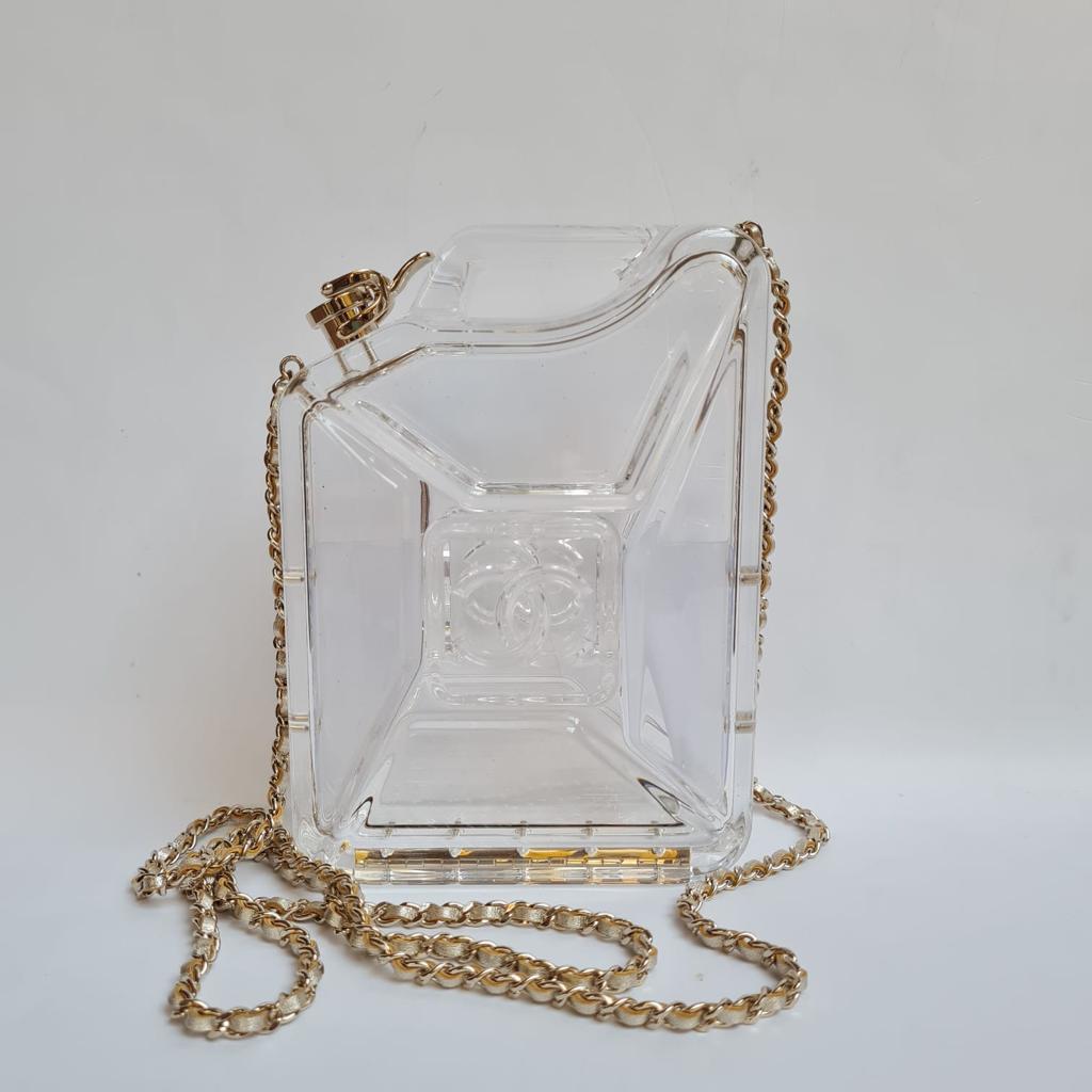 This runway bag is made of clear plexiglass in the style of a 