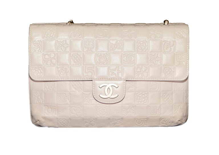 Chanel Limited Edition Embossed Logo Two Sided Flap Bag at 1stDibs