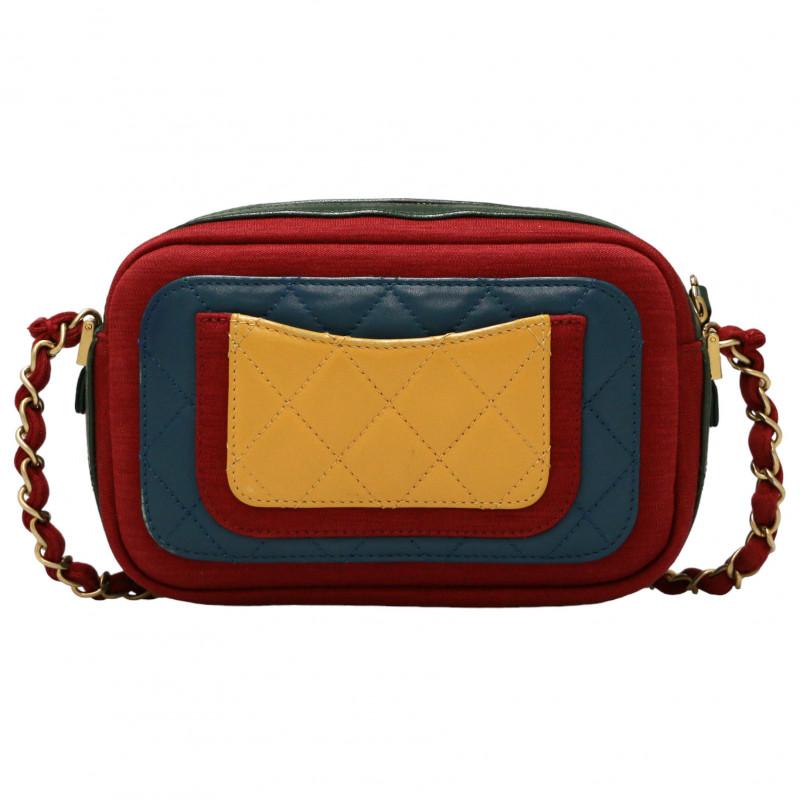 Collector Multicolor Chanel bag

Condition : very good, delivered in its original CHANEL dustbag and box
Made in Italy
Collection : mini Camera
Material : lambskin, jersey
Interior : burgundy textile
Color : red, blue, green, yellow
Dimensions : 20