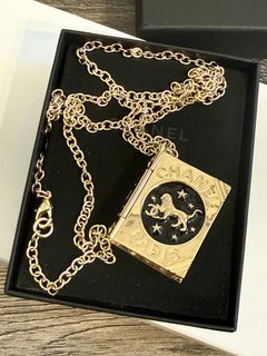 Chanel Lion Book Gold Locket Pendant Necklace, Cruise 2022 Collection