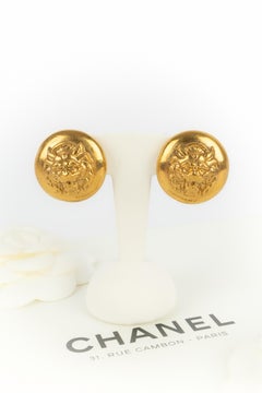 Chanel lion earrings
